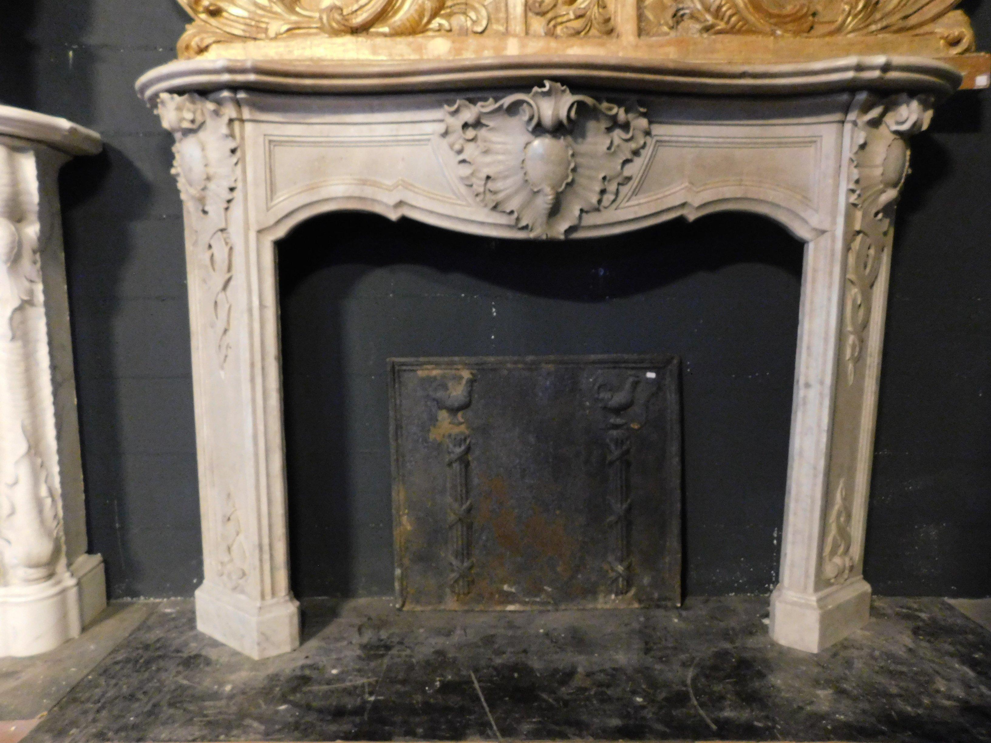 Antique mantel fireplace, hand carved in precious white grey marble, richly carved with floral and vegetable motifs, great luxury and prestige of refined sculpture, built in the early 19th century, for a noble family palace in northern Italy,