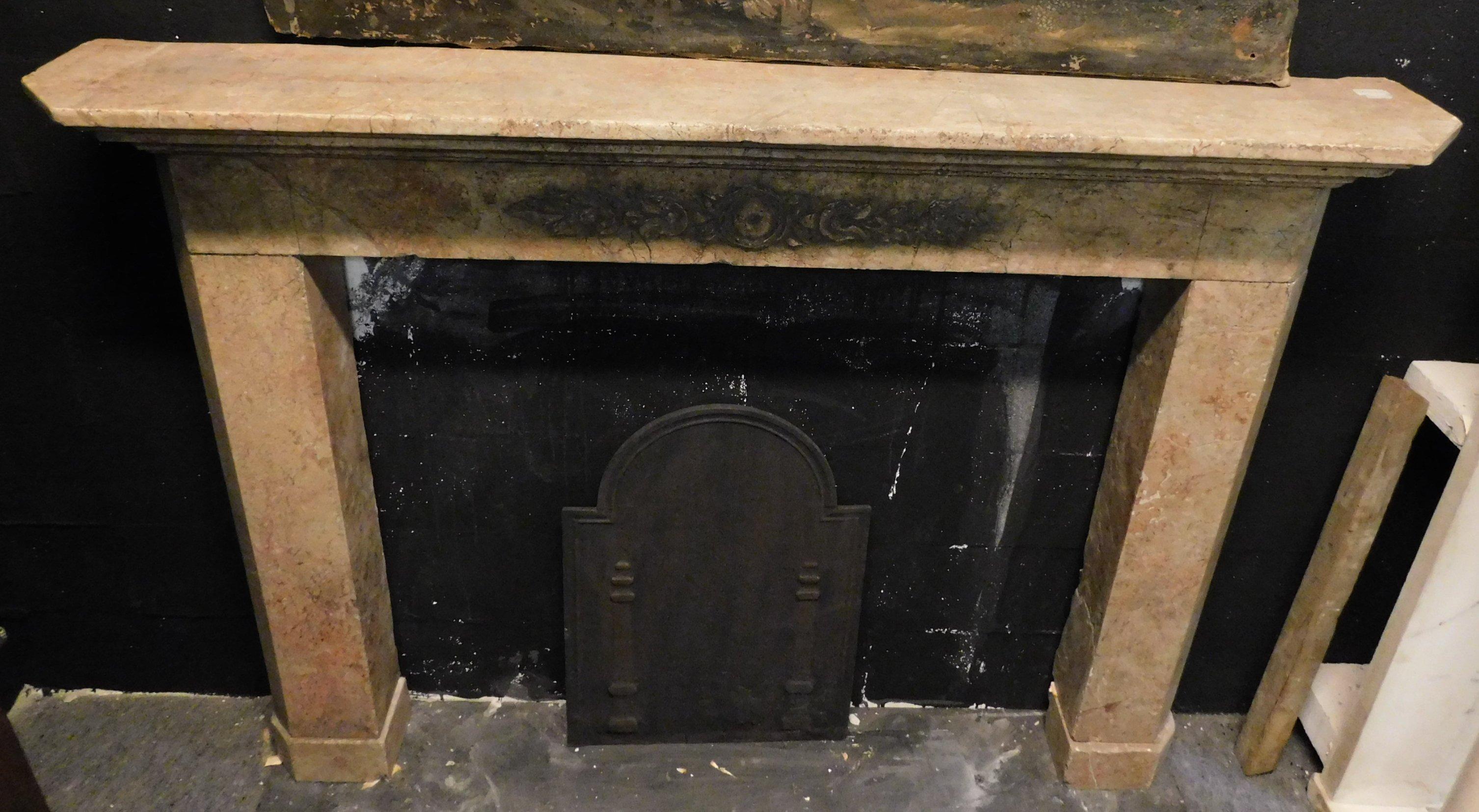 pink marble fireplace surround