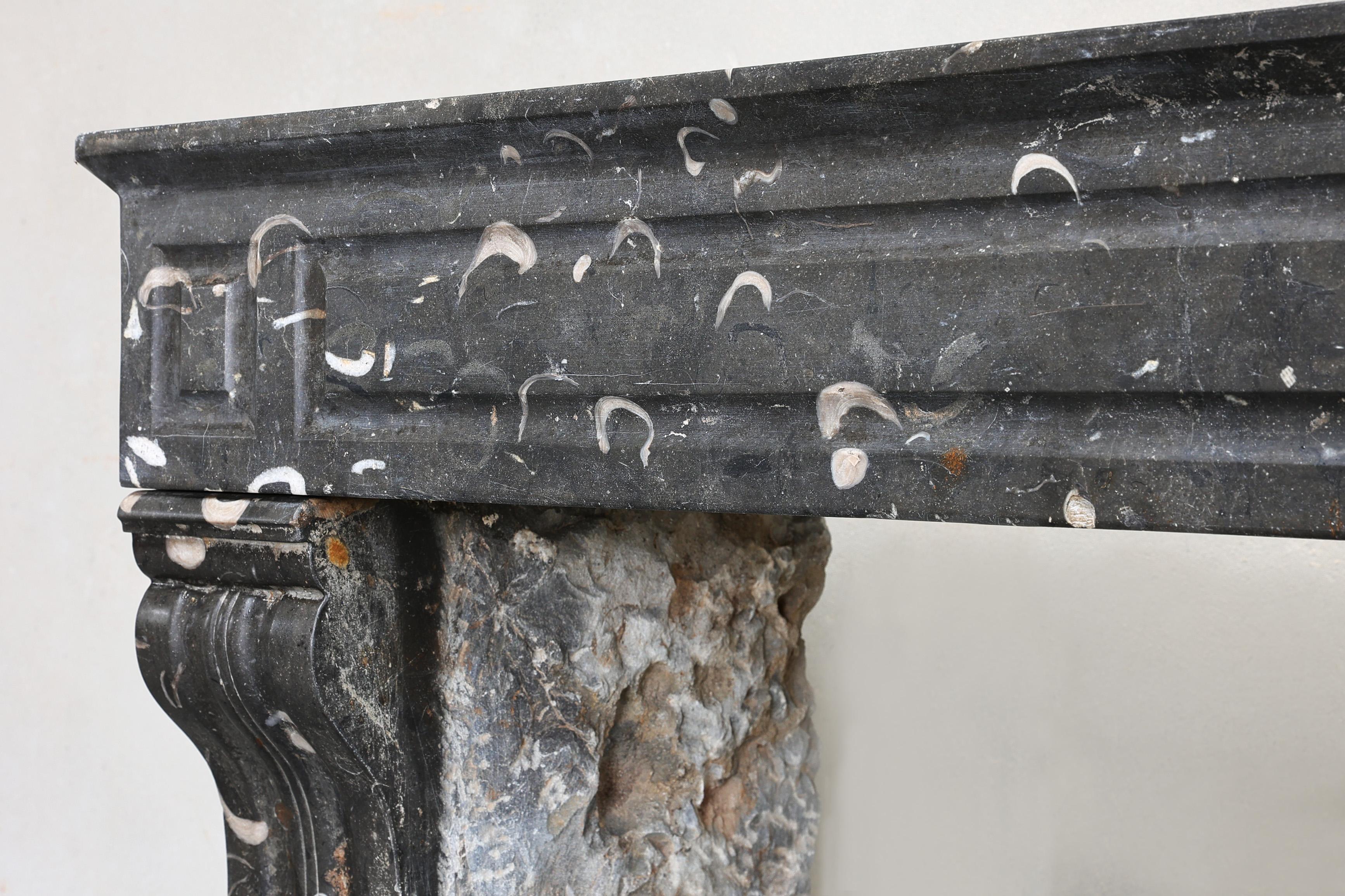 19th Century Antique fireplace of black marble with white veins from the 19th century For Sale