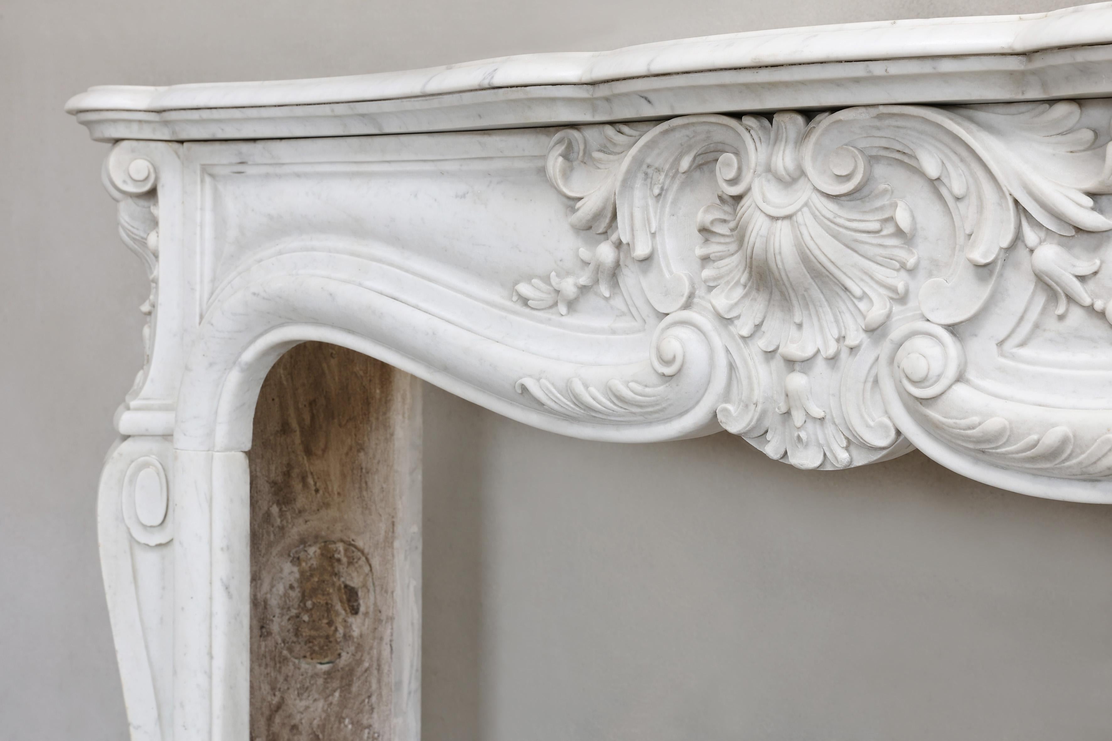 Marble Antique fireplace of carrara marble in style of Louis XV For Sale