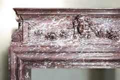 Antique fireplace of Fleur de Peche marble, 19th century, Louis XIII style