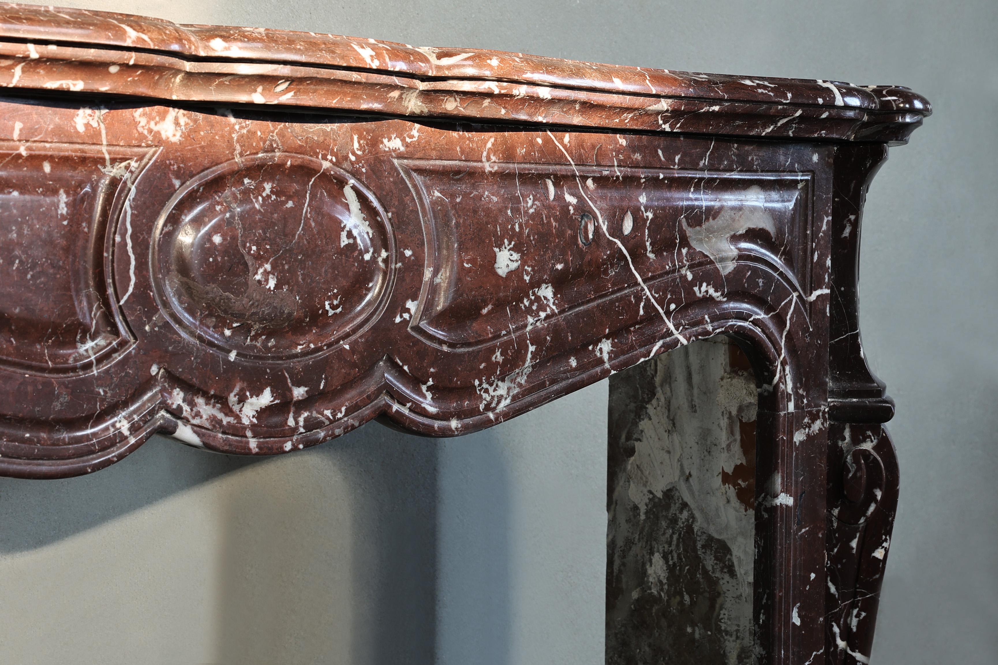 French Antique fireplace of Griotte Rouge marble form the 19th century For Sale