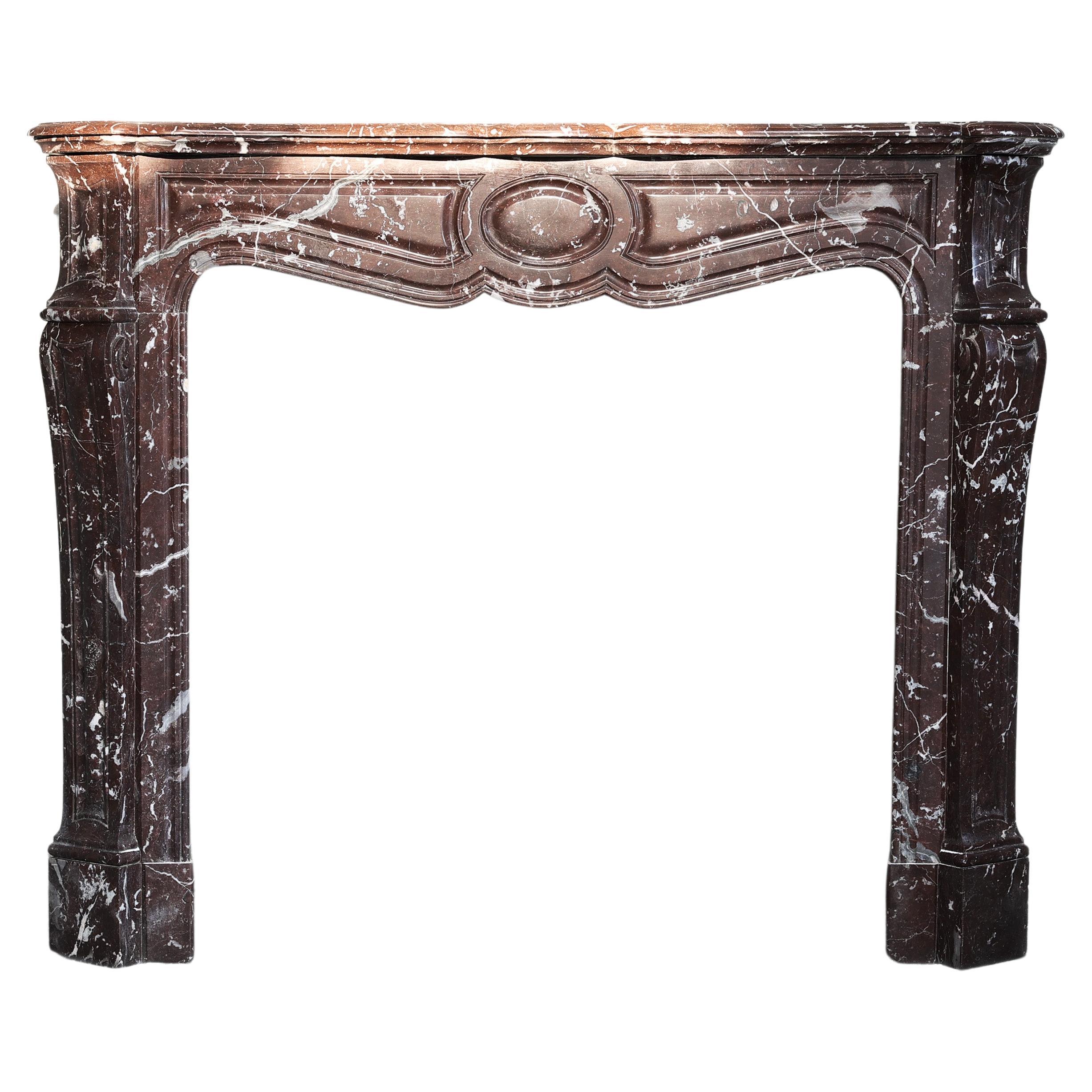 Antique fireplace of Griotte Rouge marble form the 19th century For Sale