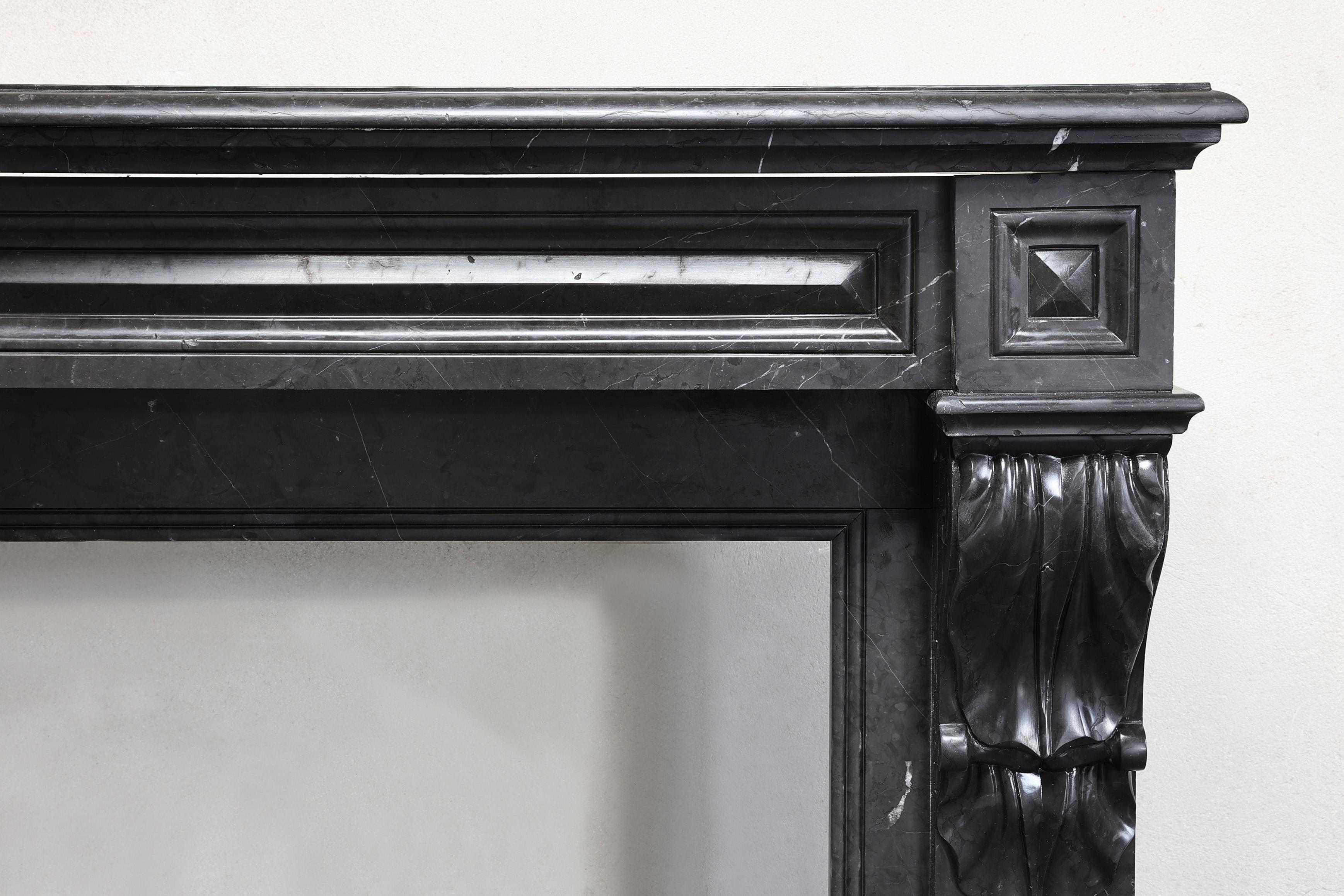 Other antique fireplace of Nero Marquina marble in style of Louis XVI For Sale