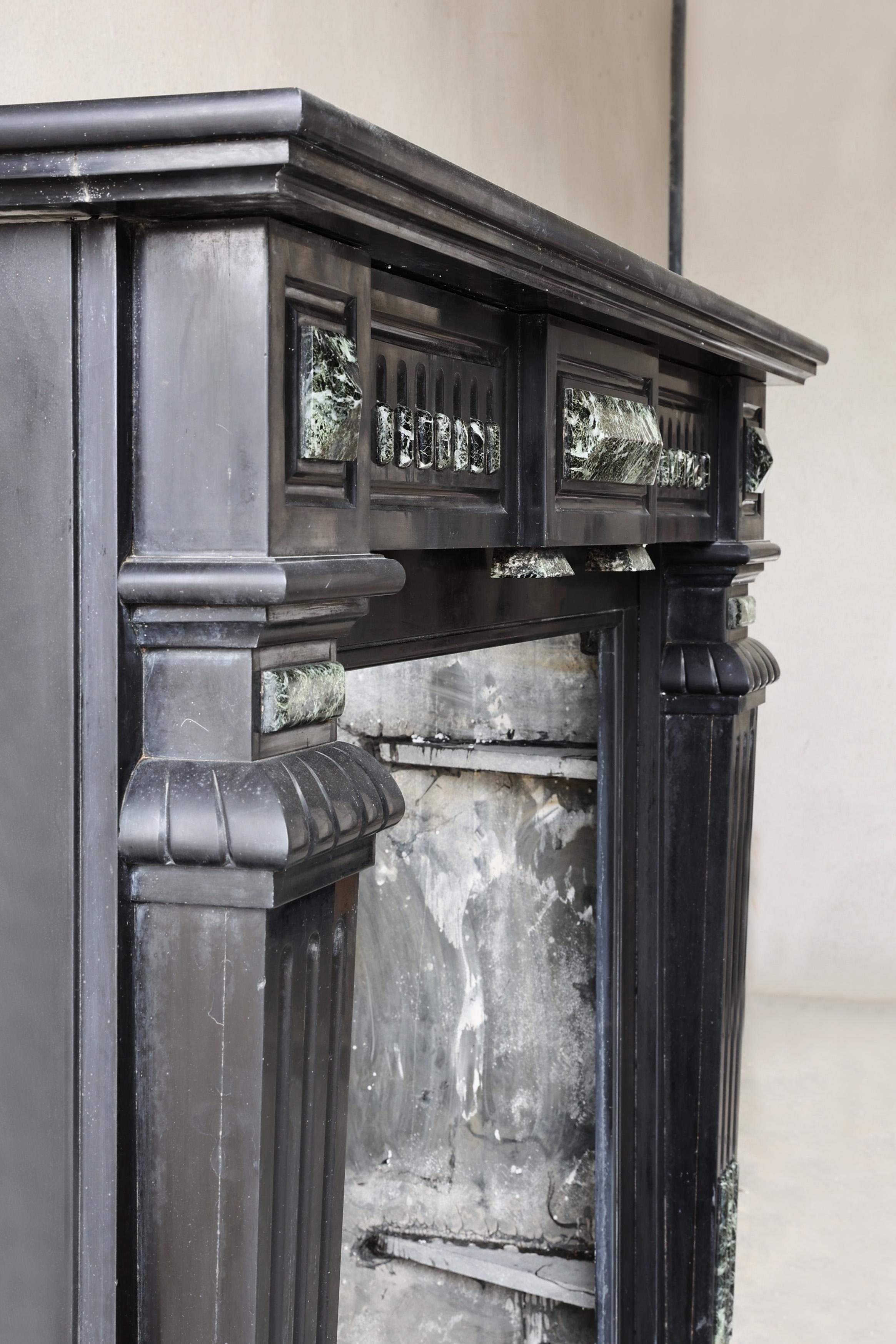 Antique fireplace of Noir de Mazy marble, 19th century, Louis XVI style For Sale 5