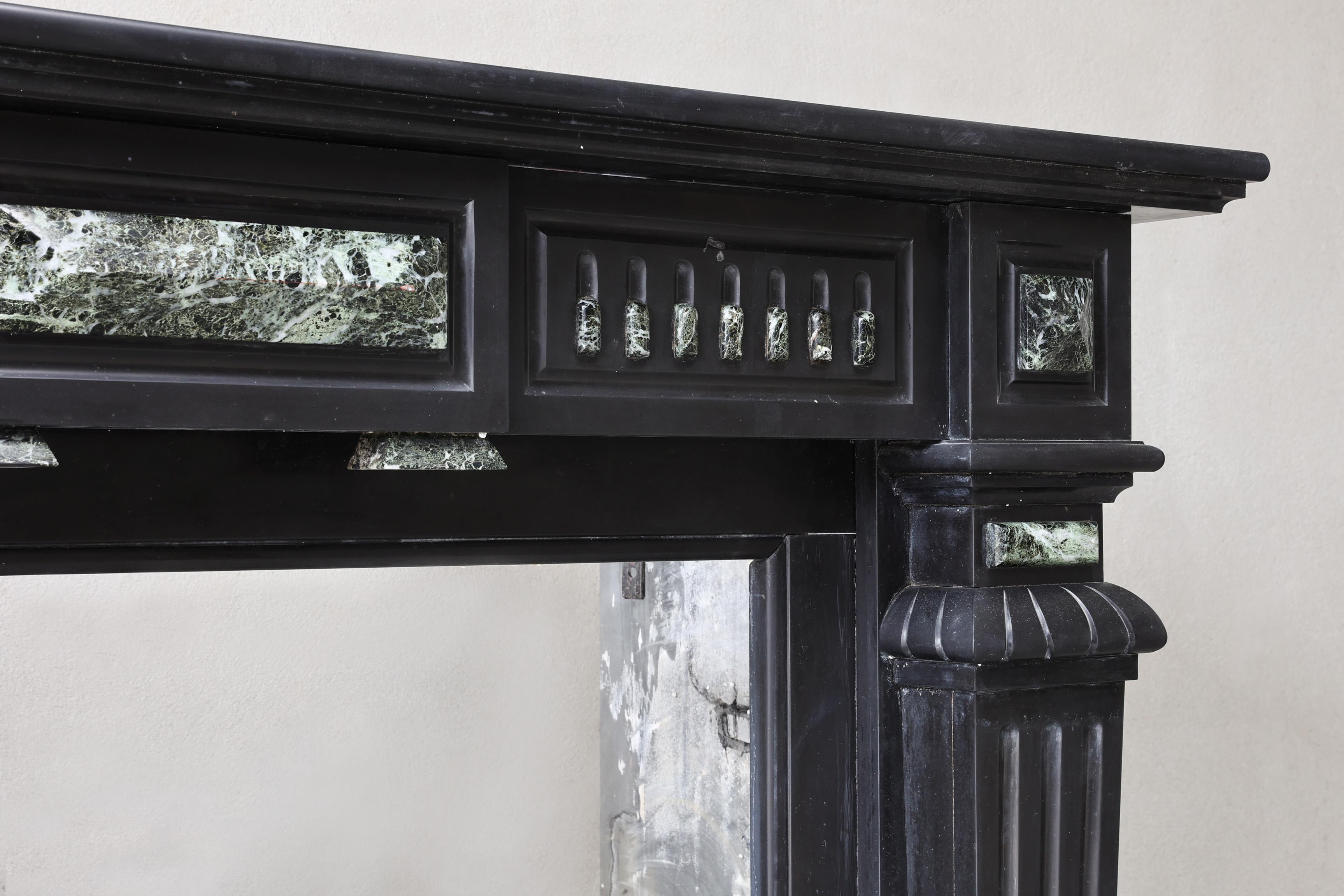 Antique fireplace of Noir de Mazy marble, 19th century, Louis XVI style In Good Condition For Sale In Made, NL