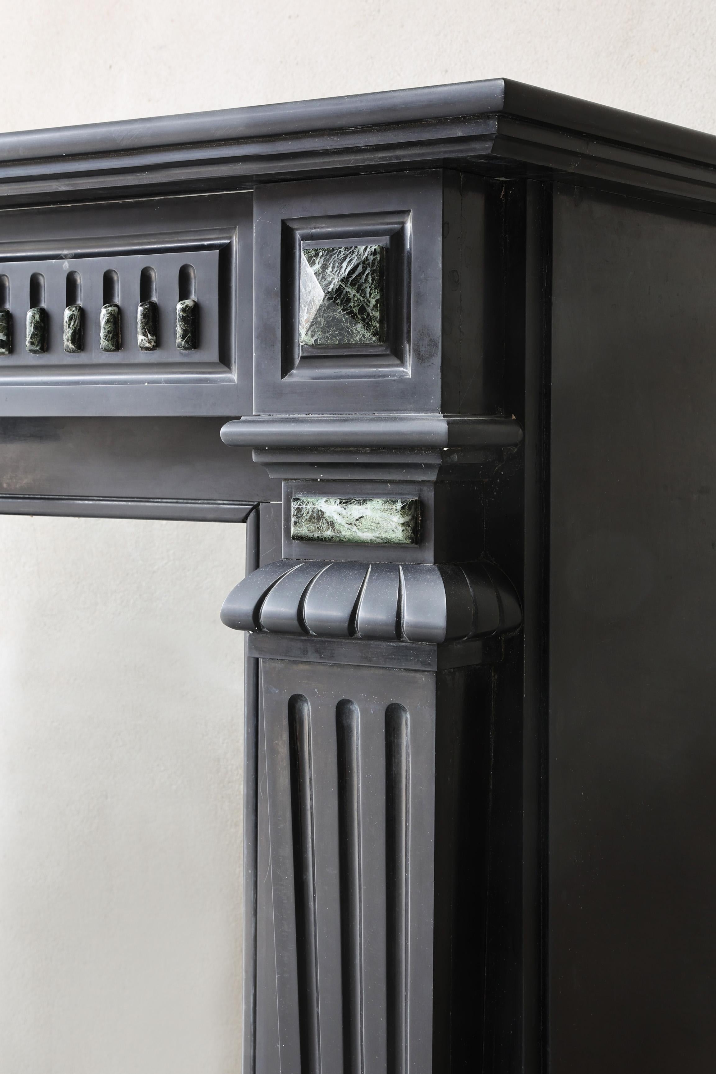 Antique fireplace of Noir de Mazy marble, 19th century, Louis XVI style For Sale 1