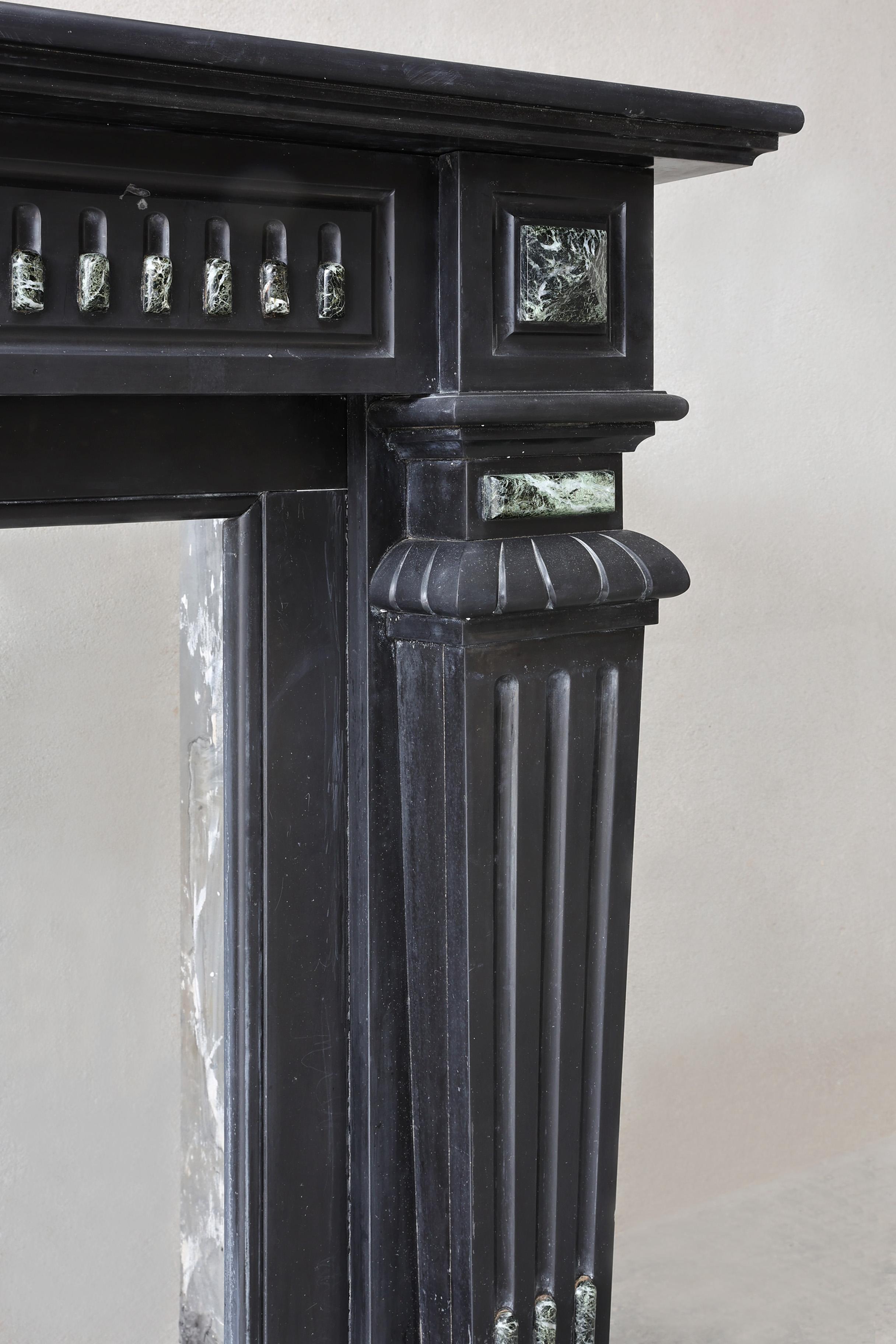 Antique fireplace of Noir de Mazy marble, 19th century, Louis XVI style For Sale 2