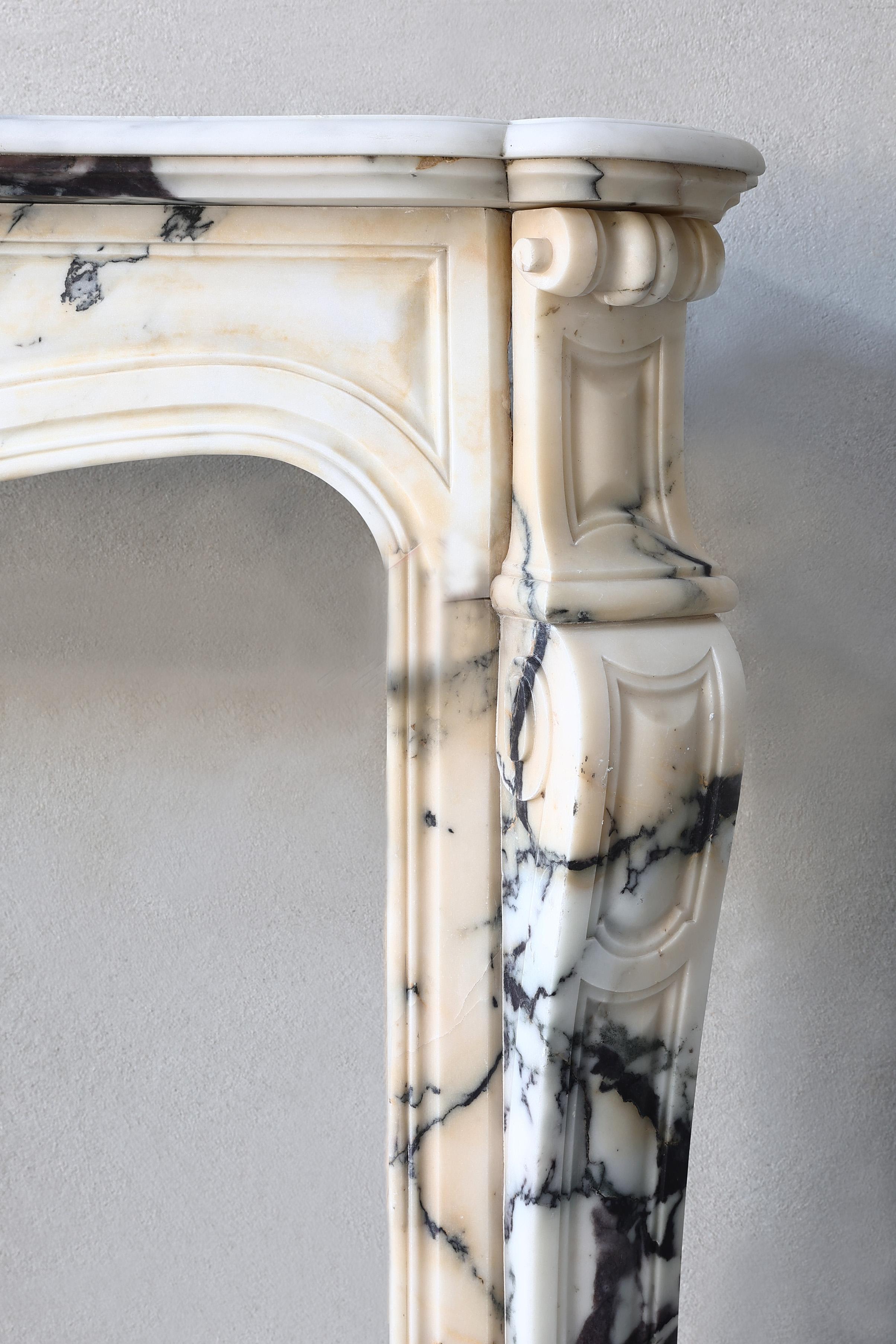 Marble Antique fireplace of paonazzo marble, 19th century, Louis XV style