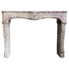 Antique Fireplace sculptured in Burgundy Stone