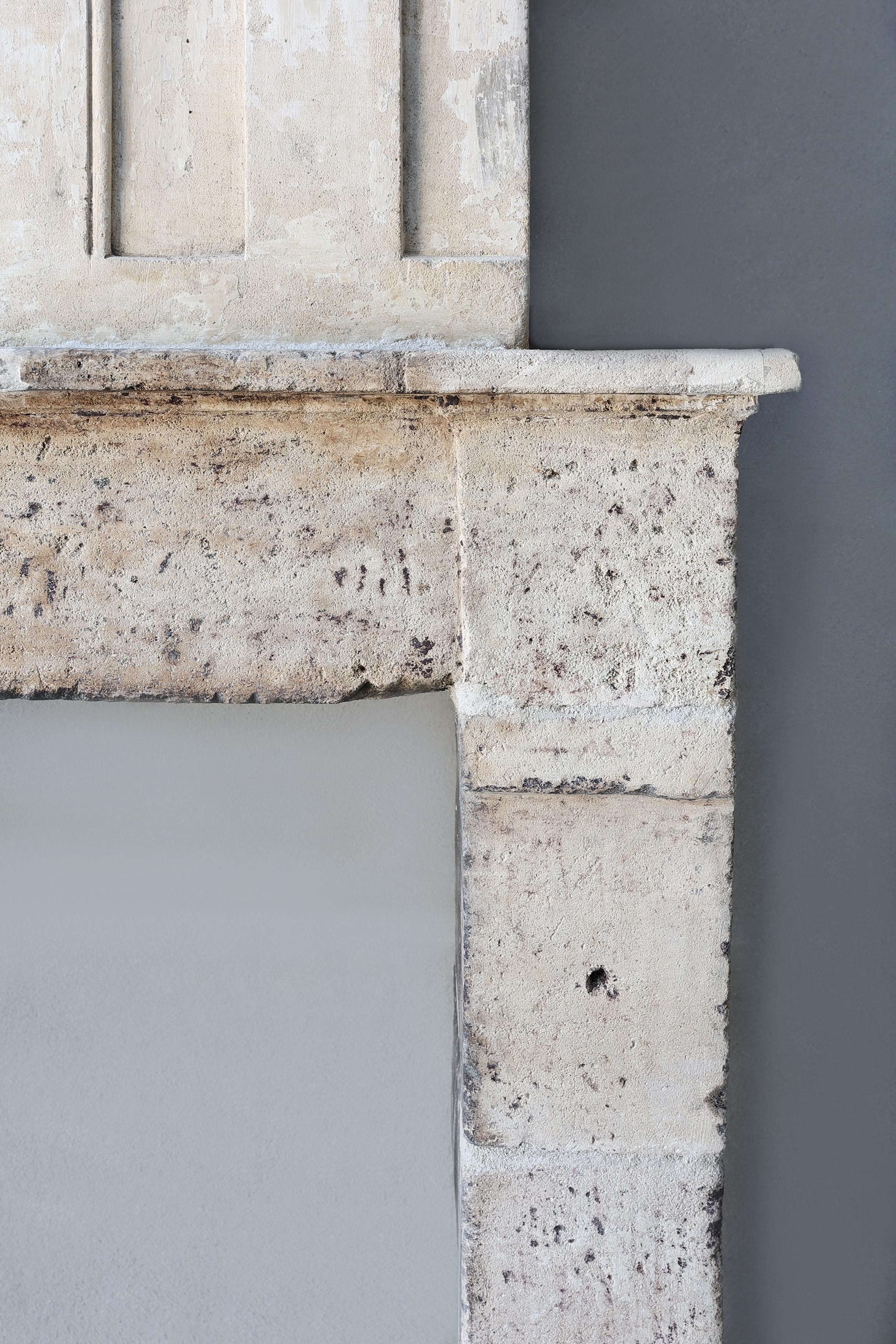 Limestone Antique Fireplace with Trumeau
