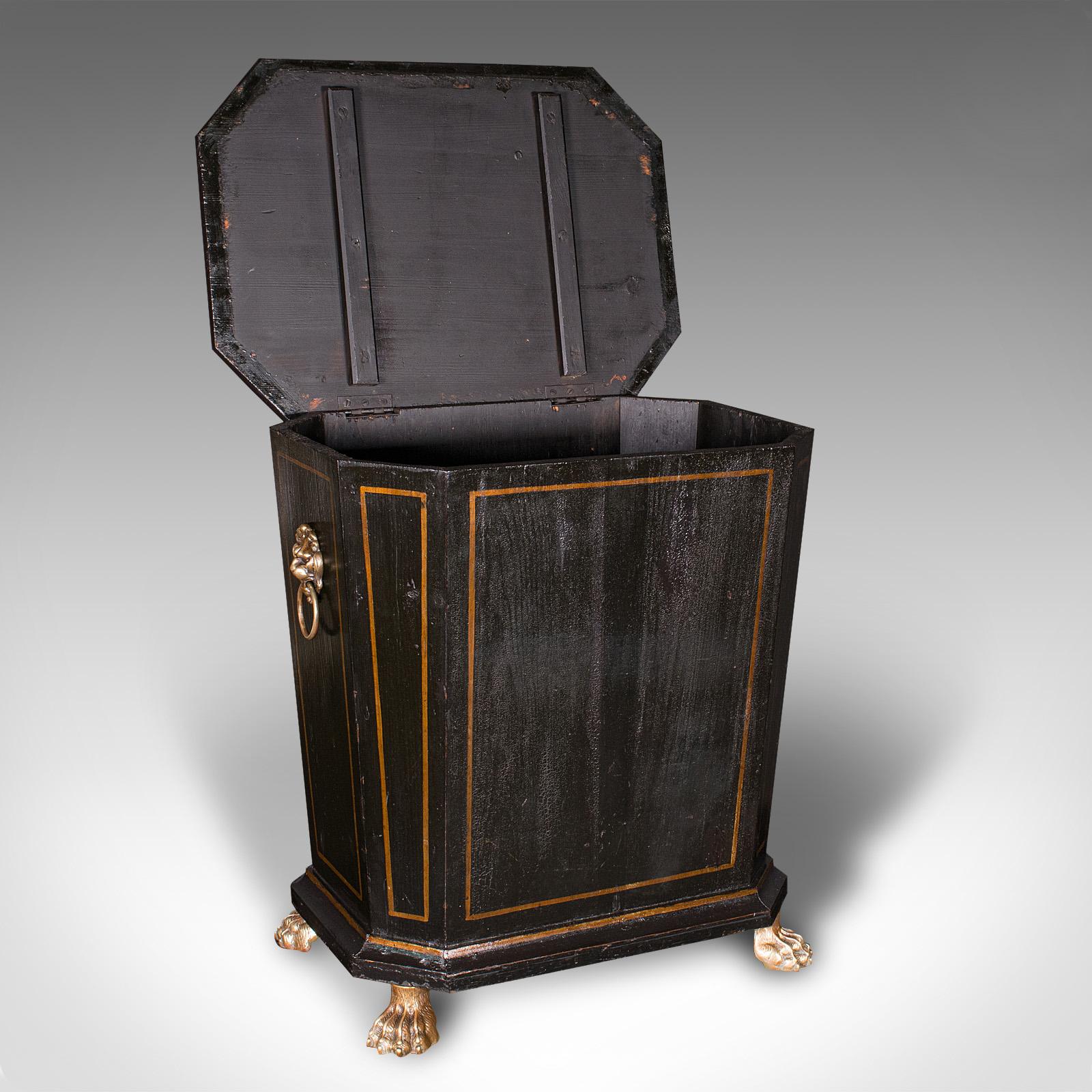 Our Stock # 24515

This is an antique fireside store. An English, ebonised pine and brass coal or log bin in Aesthetic Period taste, dating to the Victorian period, circa 1880.

Appealing example from the Aesthetic period, with charming
