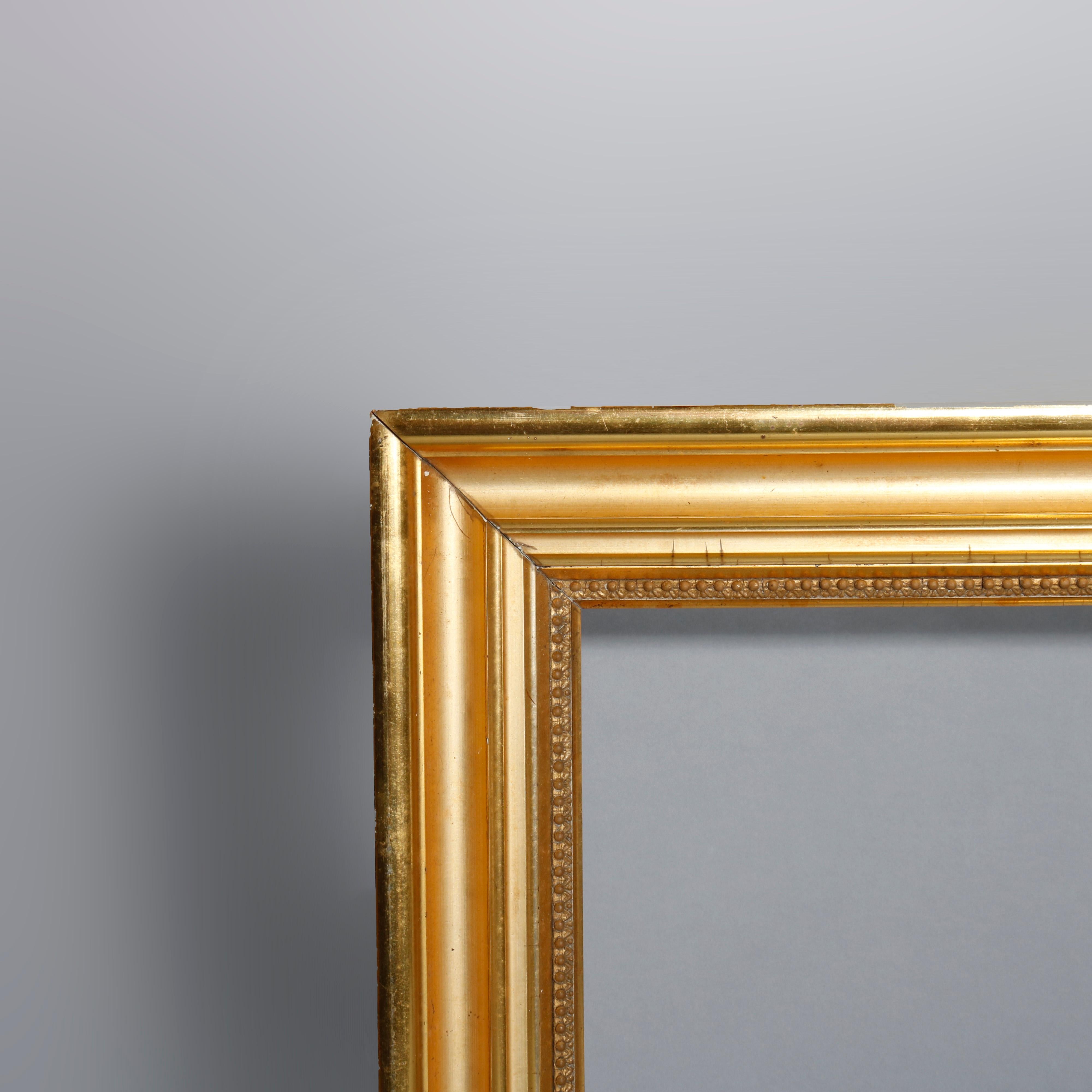 An antique first finish lemon giltwood painting frame, circa 1840

Measures: 22