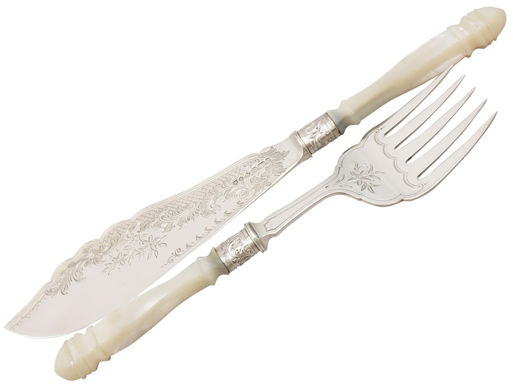 A fine and impressive pair of antique Edwardian English sterling silver and carved mother of pearl handled fish servers - boxed; an addition to our silver flatware collection

This fine and impressive pair of antique Edwardian sterling silver and