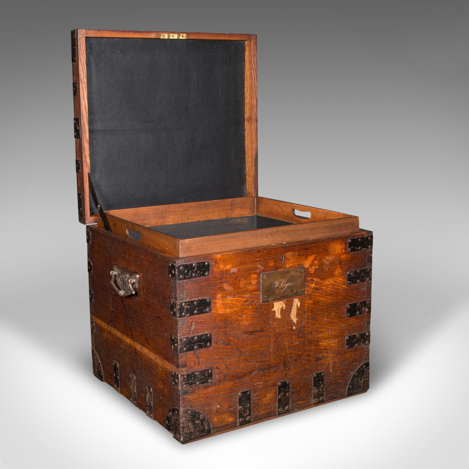 
This is an antique fitted silver chest. An English, oak and bound iron shipping trunk, dating to the late Victorian period, circa 1880.

Fascinating bound example, with superb Victorian storage appeal
Displays a desirable aged patina and in good