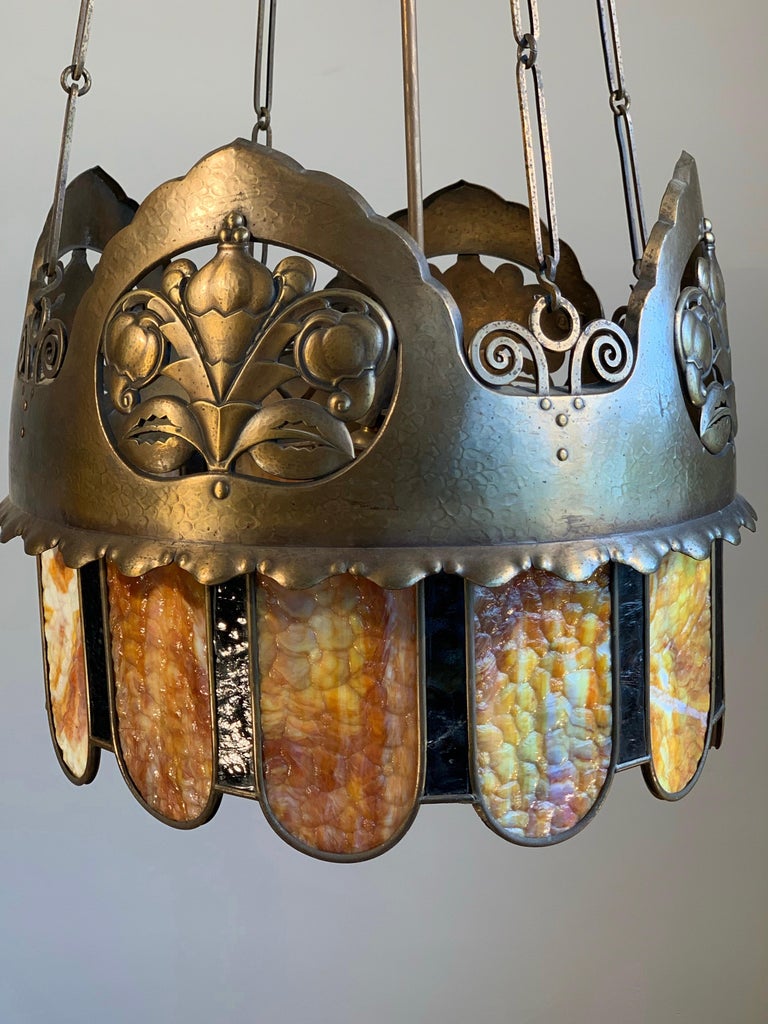 Stunning, sizeable and highly decorative Arts & Crafts light fixture.

This gorgeous, five-light chandelier is another one of our recent great finds. Inspired by the beauty of nature and wildlife and motivated by the renewed interest in anything