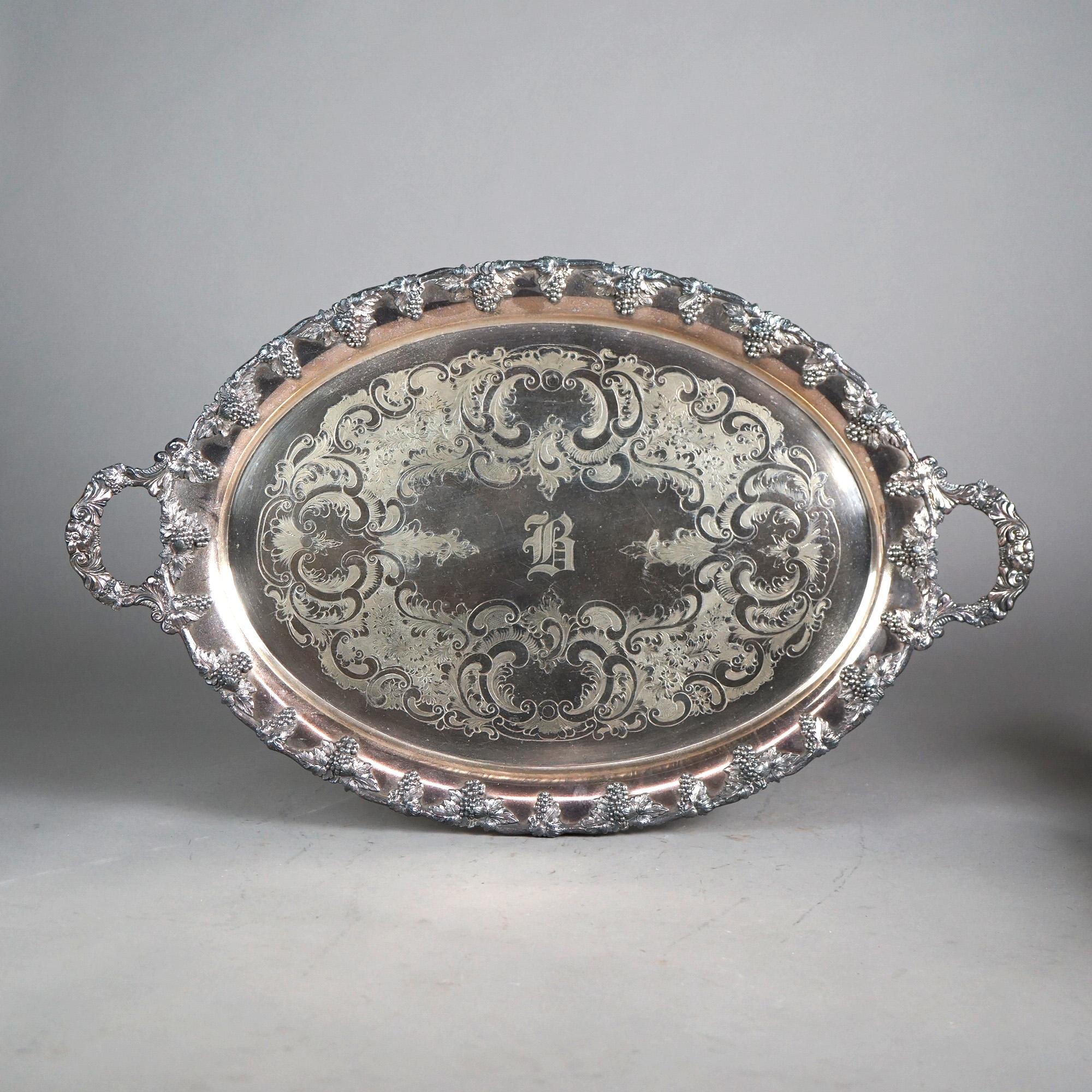 Antico servizio da tè in cinque pezzi placcato in argento di E. B. Maltby con incisione di foglie C1890

Misure - 10,5 