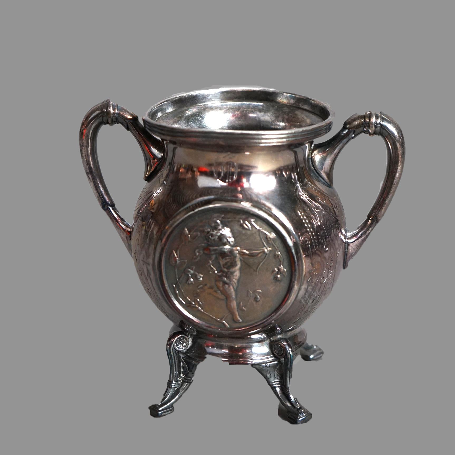 Antico set da tè figurato in argento di cinque pezzi di Reed & Barton. Piede con incisione fogliare, C1890.

Misure - 11,75 