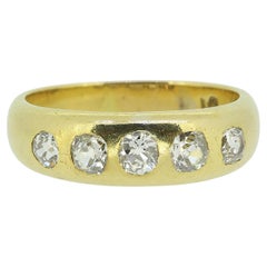 Anello antico con cinque pietre e diamanti