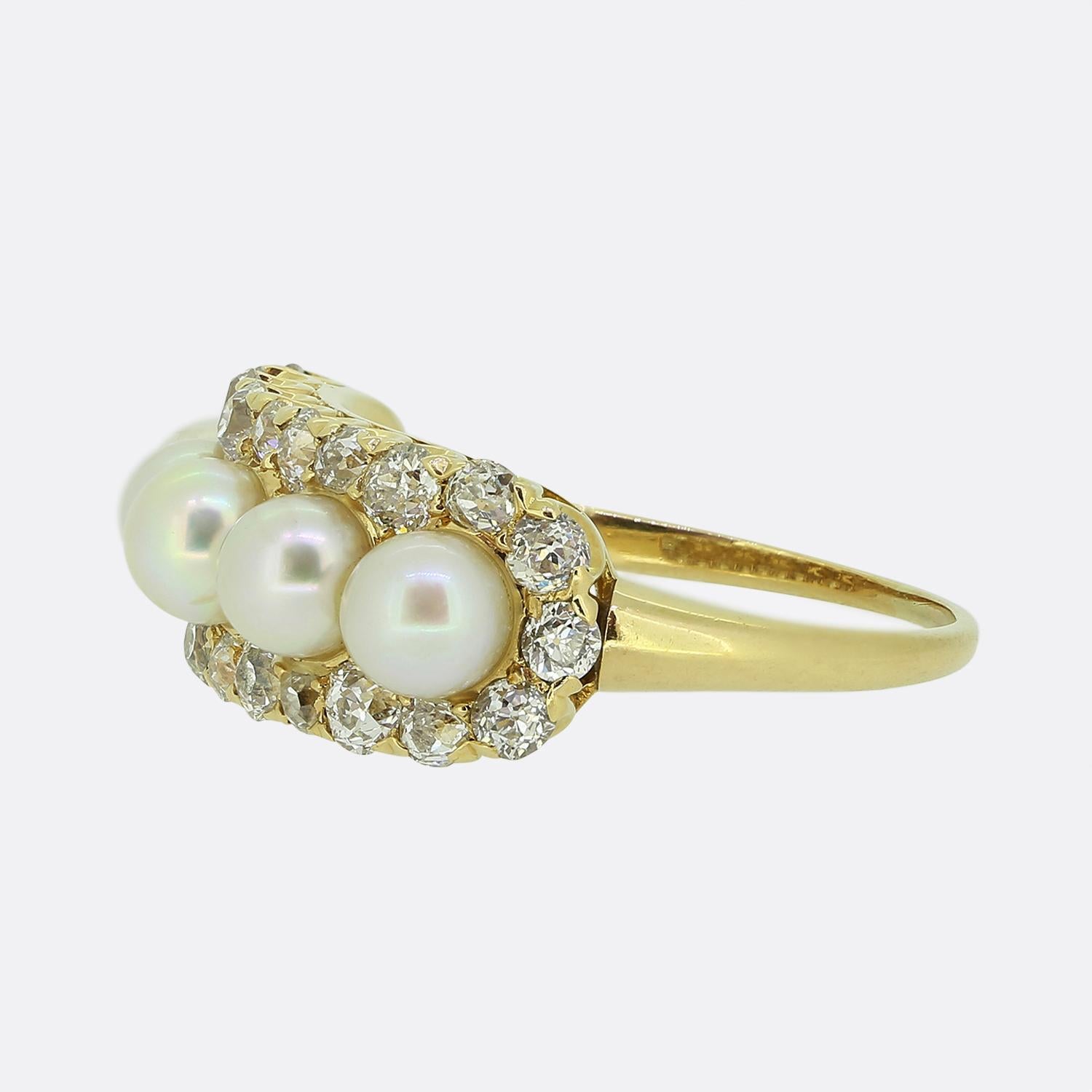 Here we have a stunning five-stone pearl and diamond ring dating back to later stages of the Victorian period. This antique piece has been crafted from a warm 18ct yellow gold and features five excellently matched pearls in a single line formation
