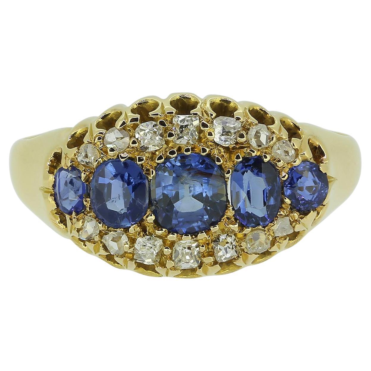 Anello antico a cinque pietre con zaffiro e diamante