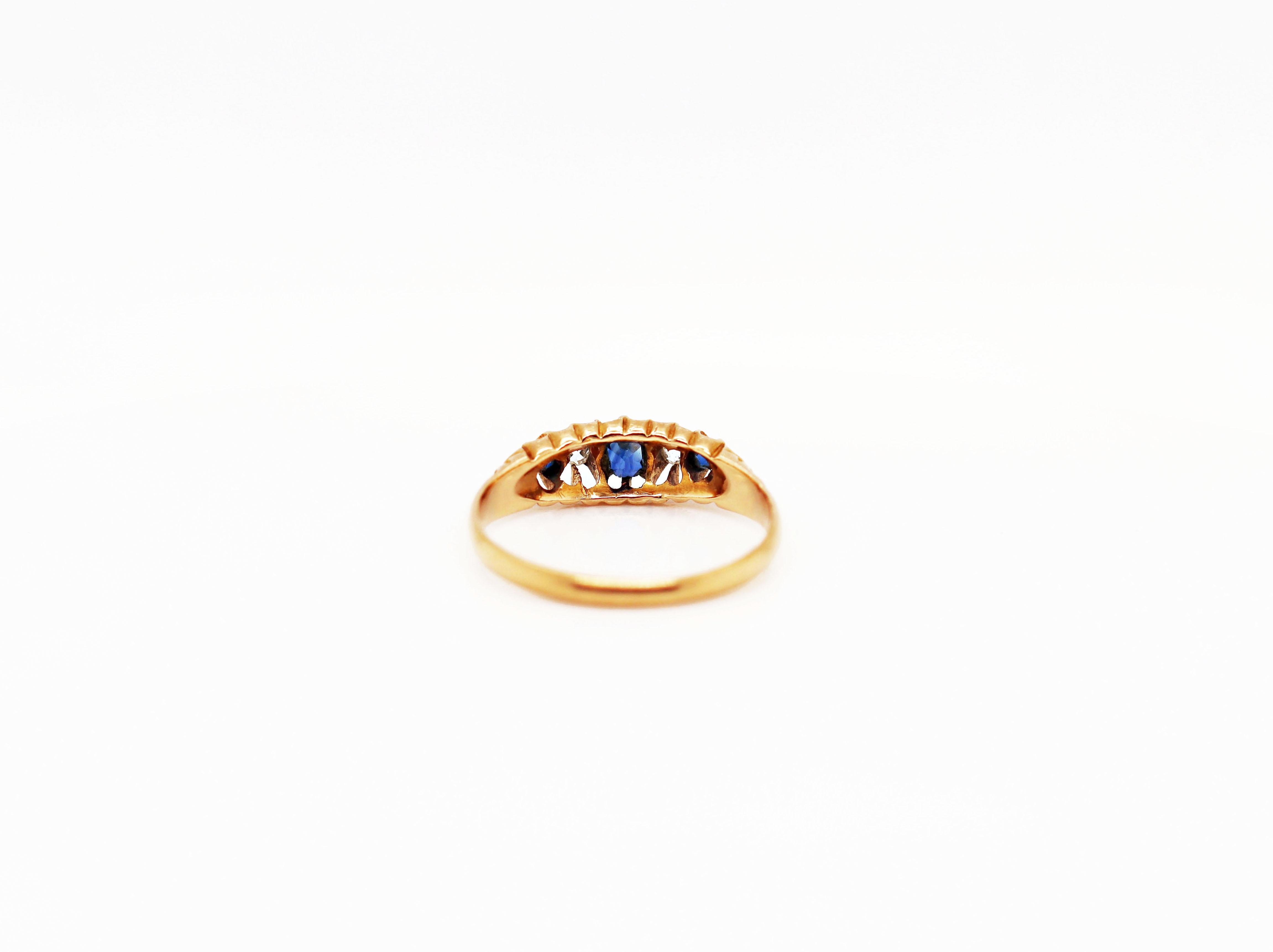 Round Cut Antique Five-Stone Sapphire and Old Cut Diamond Yellow Gold Ring, 1906