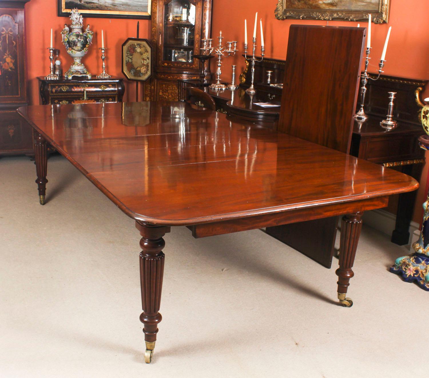 English Antique Flame Mahogany Extending Dining Table 19th Century and 10 Chairs