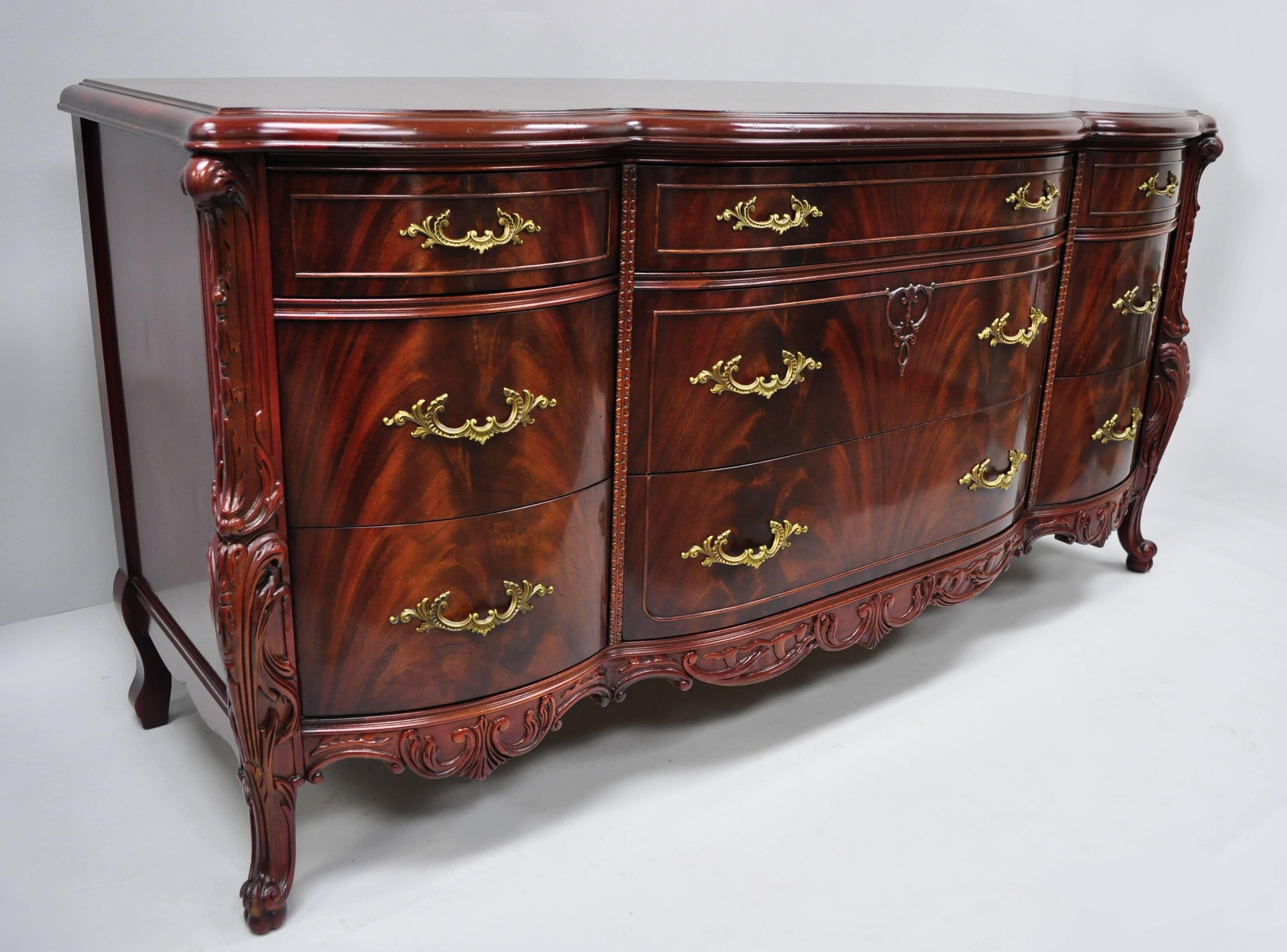 Antique flamed mahogany triple dresser in the French 