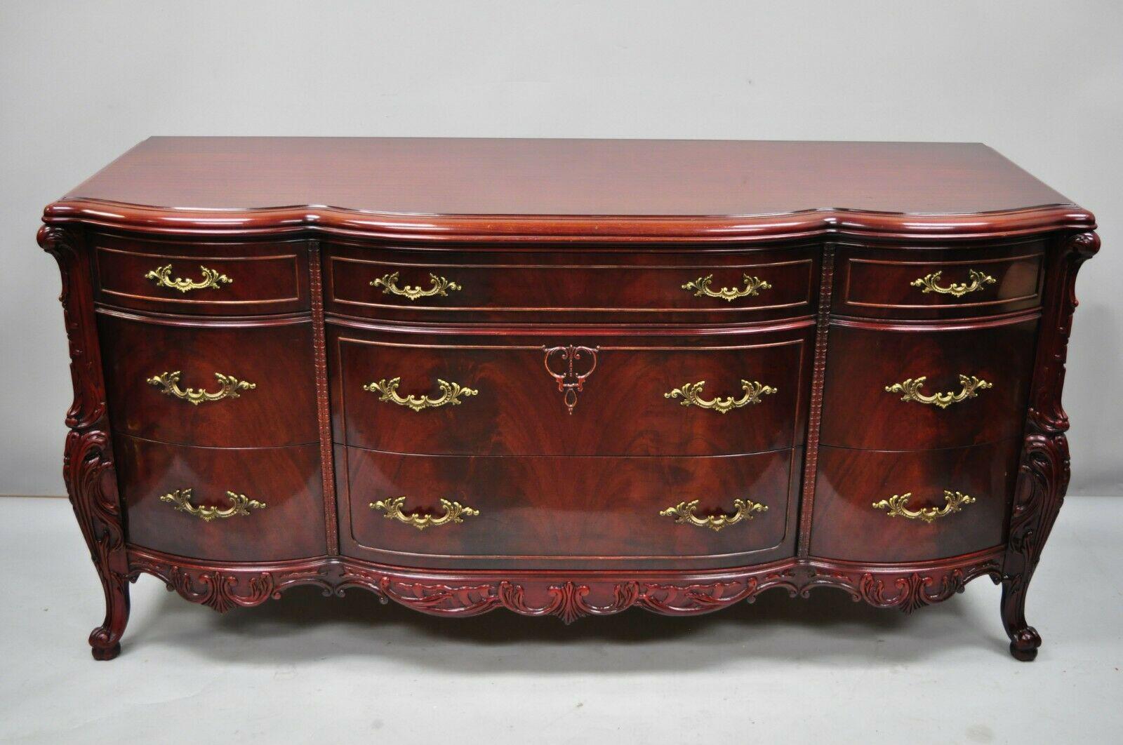 Antique Flamed Mahogany Triple Dresser in the French 