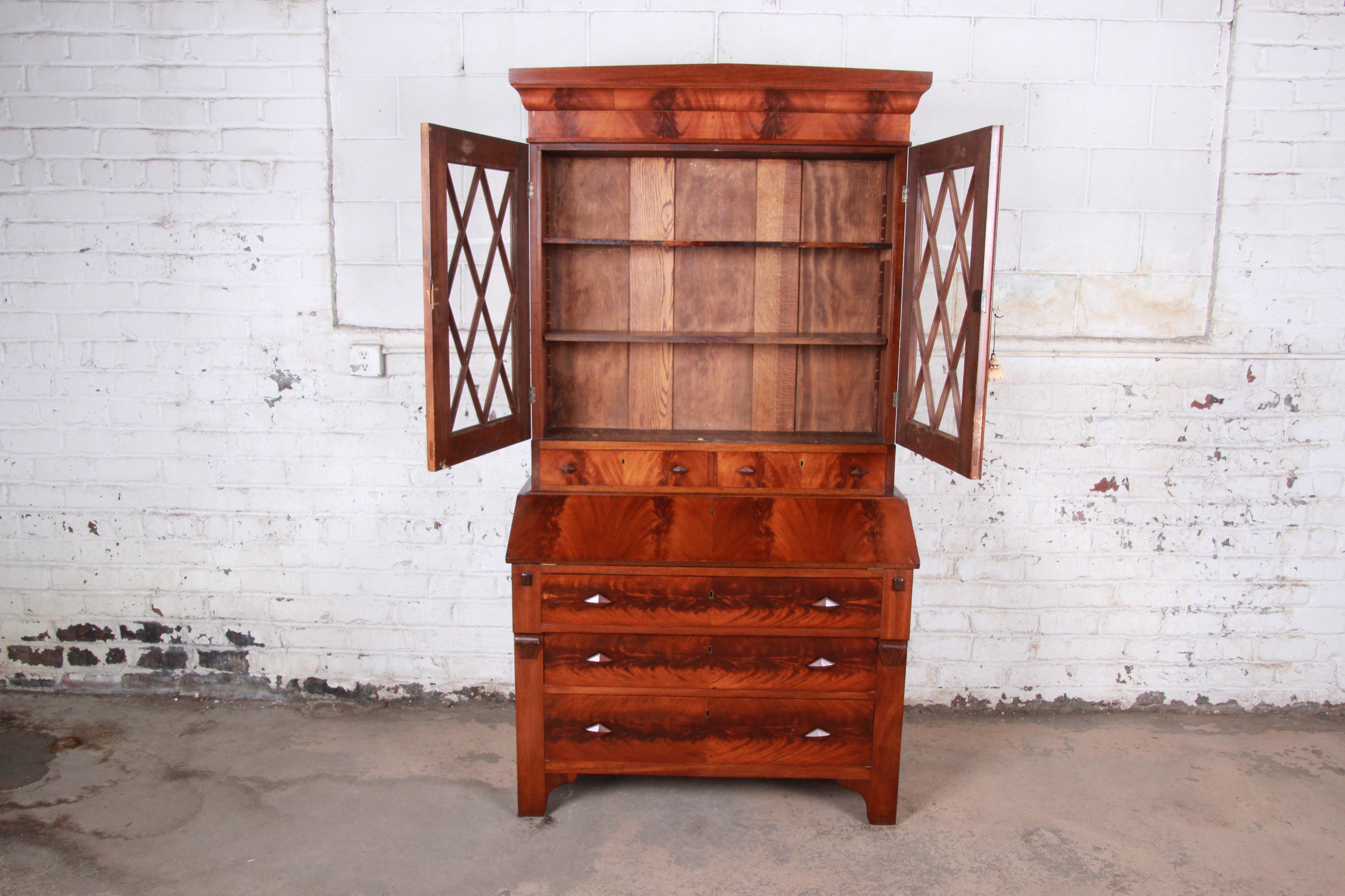 Antique Flame Mahogany Slant Front Secretary Desk with Bookcase, circa 1850s In Good Condition In South Bend, IN