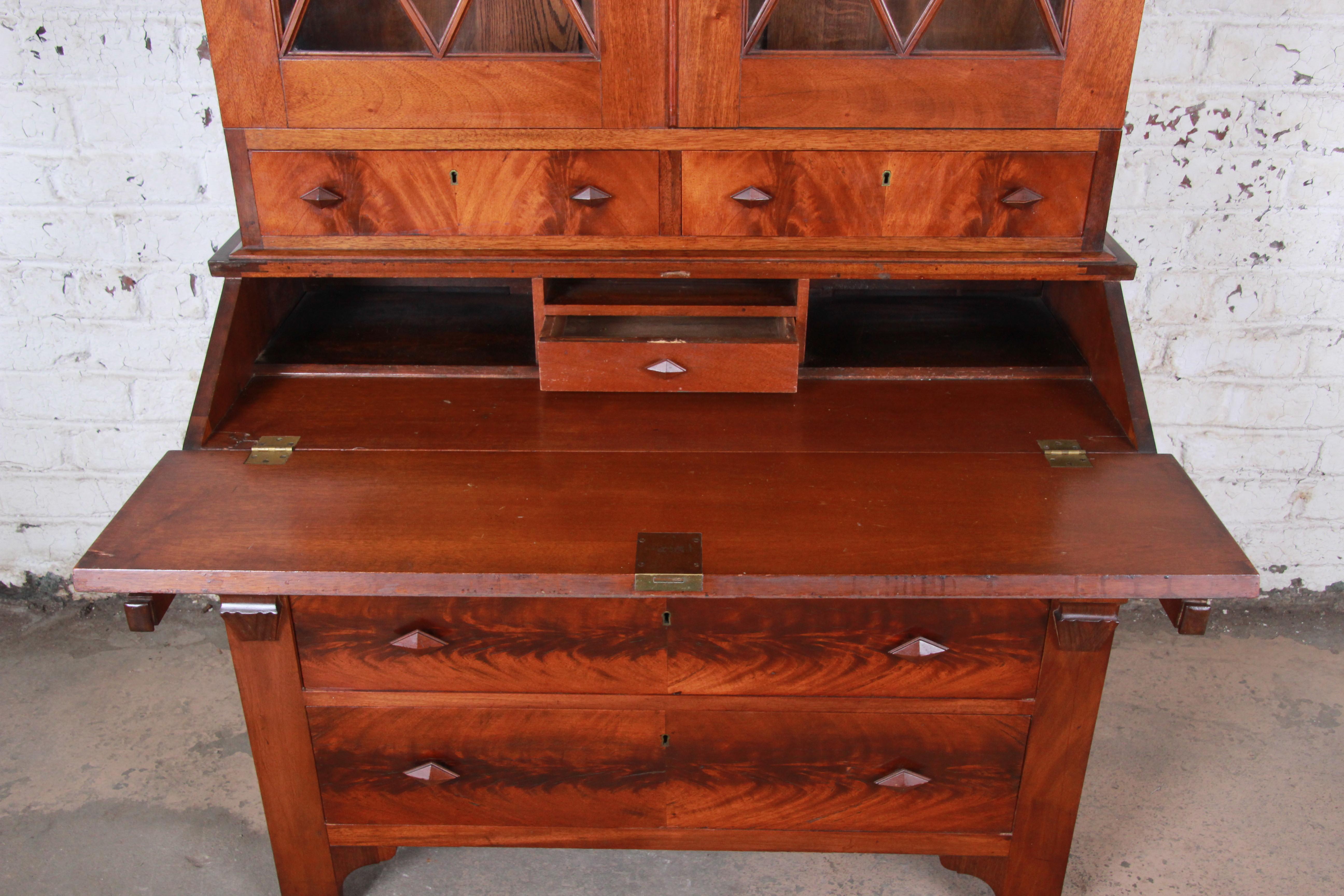 Glass Antique Flame Mahogany Slant Front Secretary Desk with Bookcase, circa 1850s