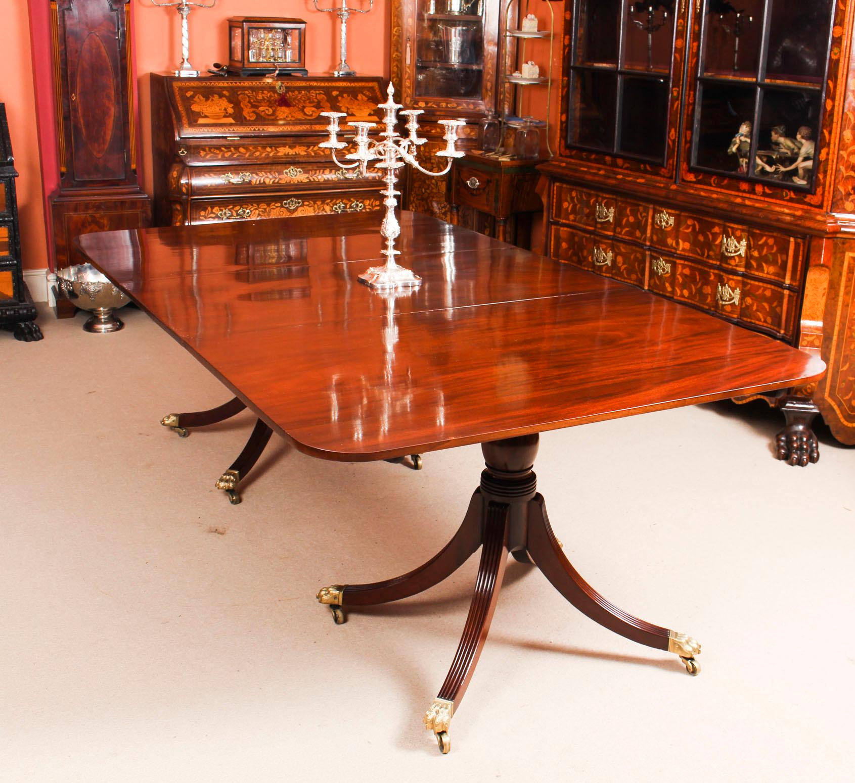 This is an elegant antique Regency dining table that can comfortably seat eight people, dating from circa 1820.

The table has one leaf that can be added or removed as required to suit the occasion and stands on twin 
