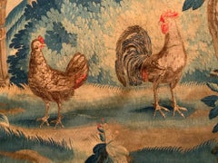 Antico arazzo fiammingo con paesaggio da giardino