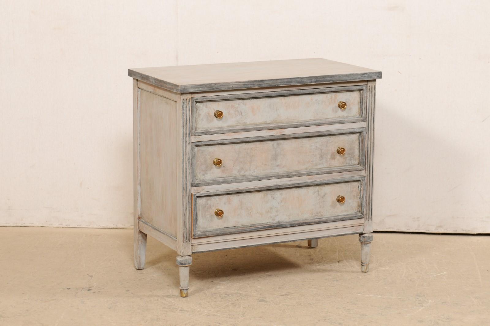 An antique, smaller-sized chest of drawers from American depression-era furniture makers 