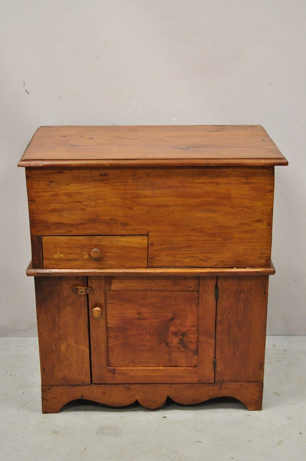 Antique Flip Top Primitive Colonial Pine Wood Washstand Commode. Item featured is a flip top, beautiful wood grain, 1 swing door, very nice antique item, quality American craftsmanship, Possibly refinished at some point over the years. Circa 19th