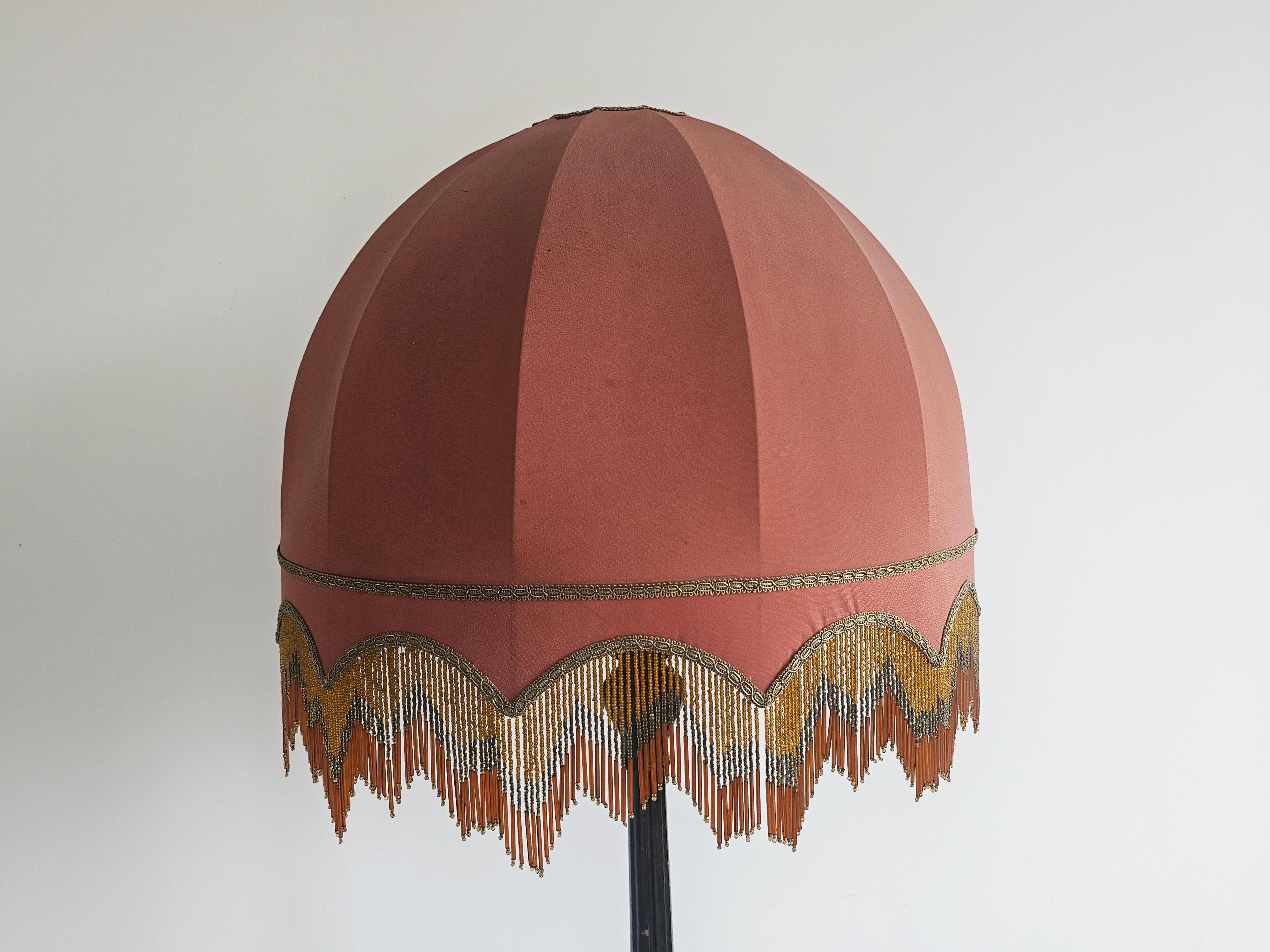 Austrian Antique Floor Lamp in carved oak, with beautiful rust-red shade, Austria 1890s For Sale