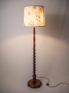 Antique floor lamp on a twisted leg