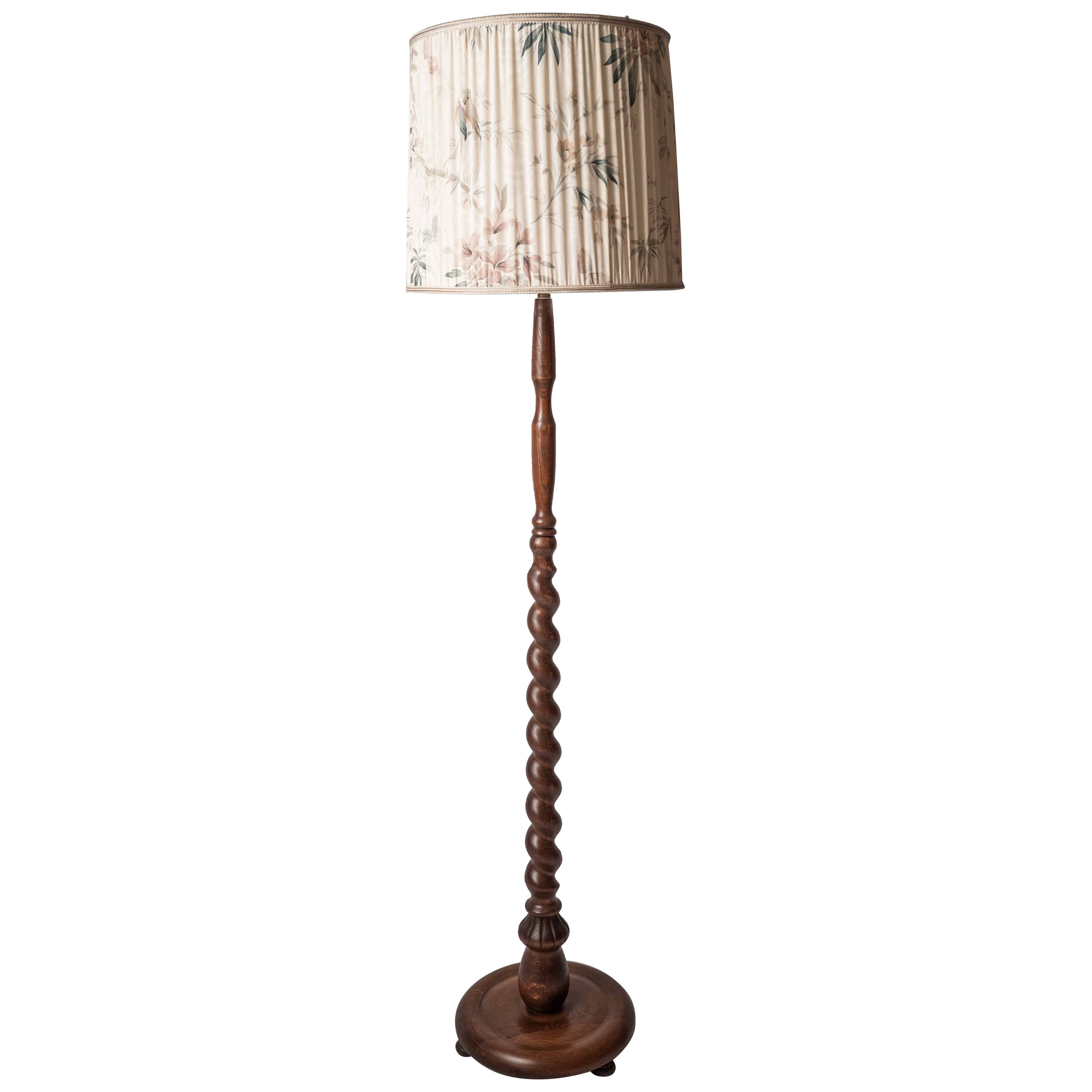 Antique floor lamp on a twisted leg For Sale