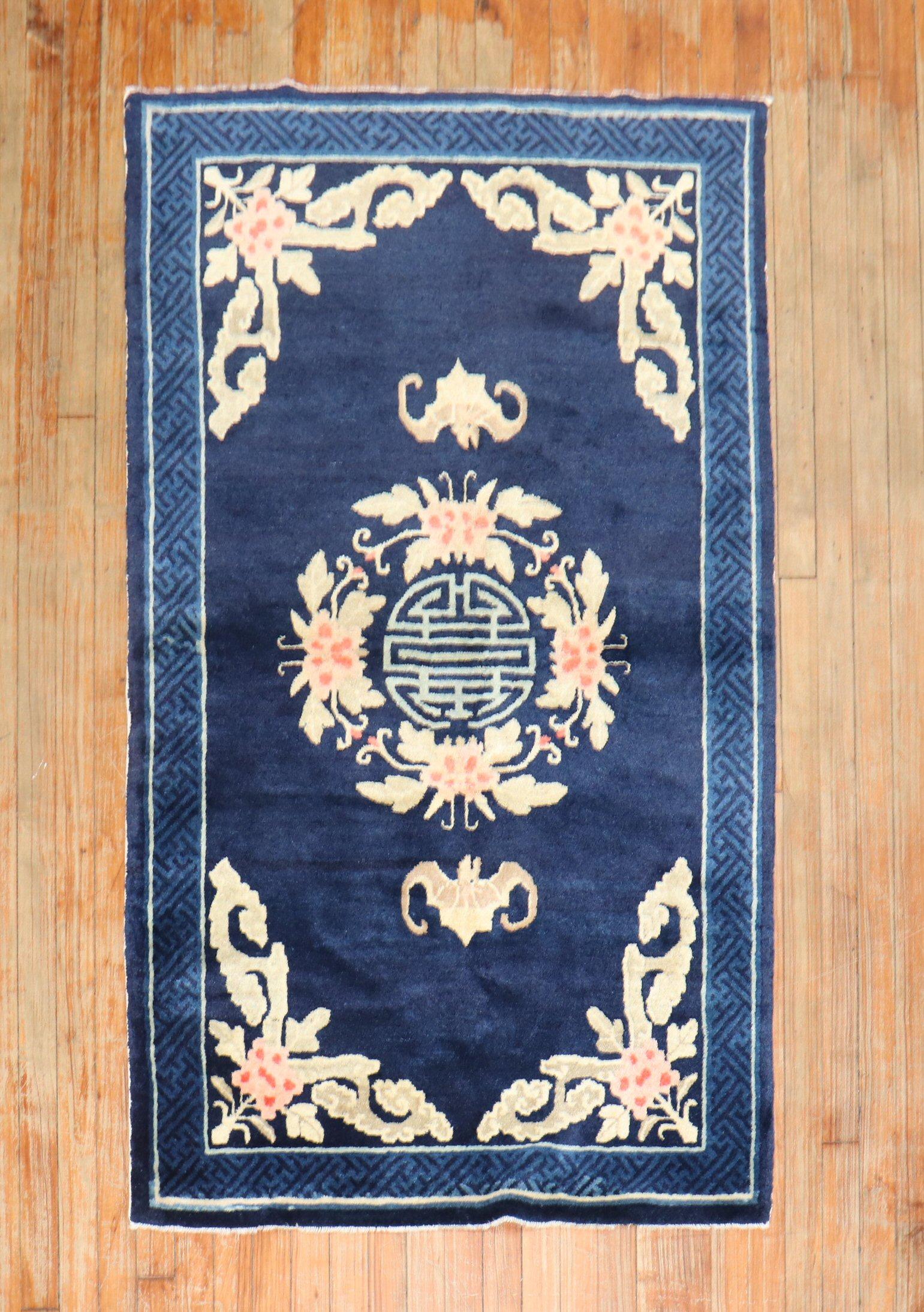 An early 20th-century Chinese Peking scatter size rug

Measures: 3'3'' x 5'5''.