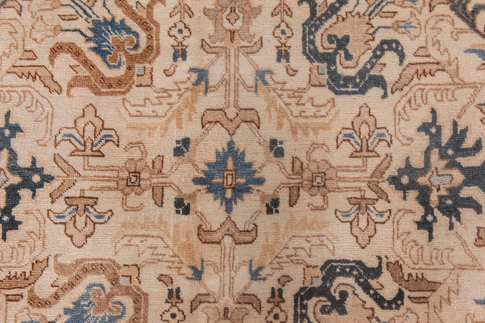 Antique floral Persian Kirman handmade wool rug
Size: 6'10