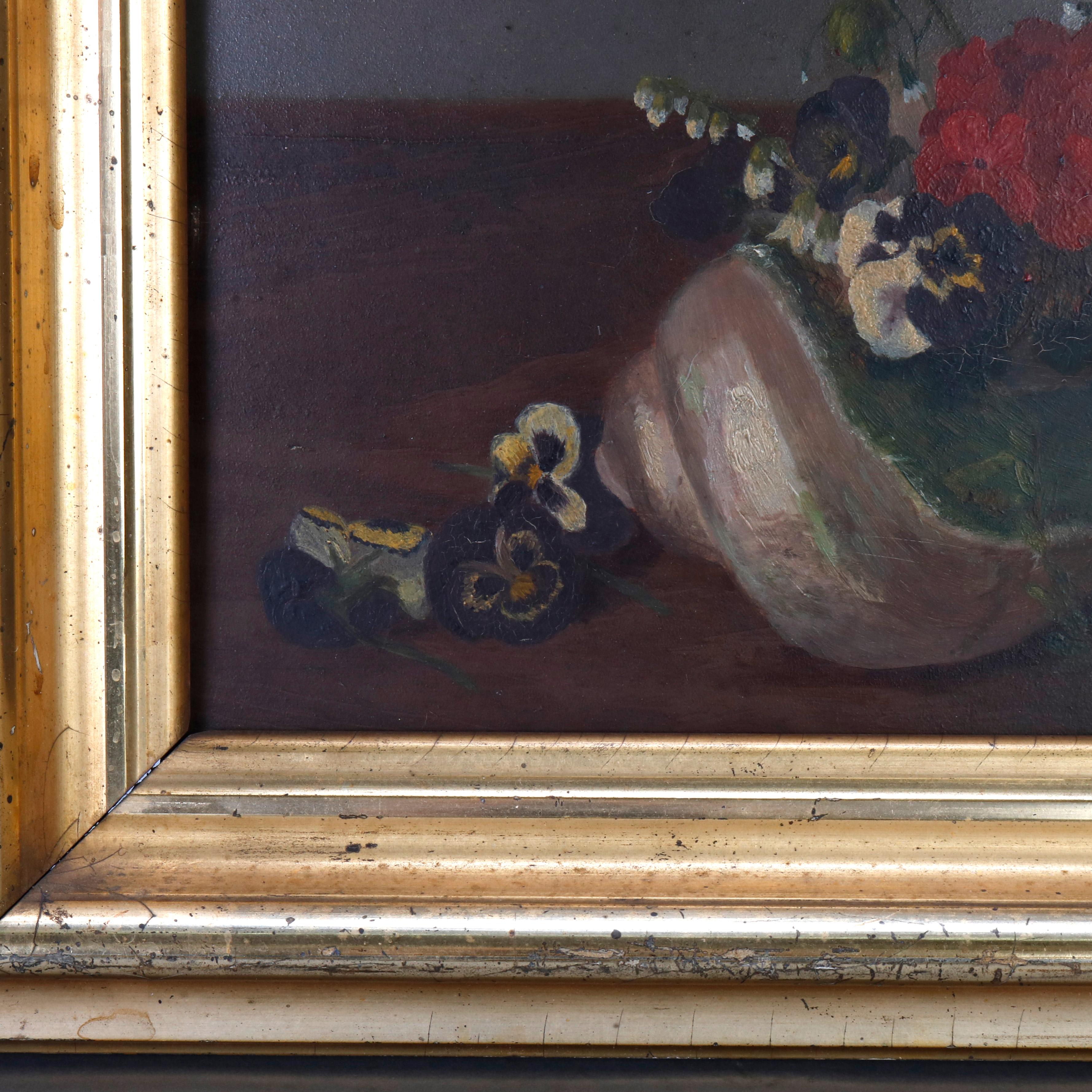 An antique painting offers oil on panel still life with flowers in seashell, artist signed lower right, seated in giltwood frame, circa 1900

Measures: 13.5