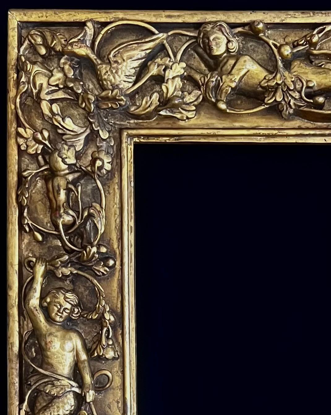 Hand-Carved Antique Florentine Hand Carved Frame with Allegorical Mythological Carvings For Sale