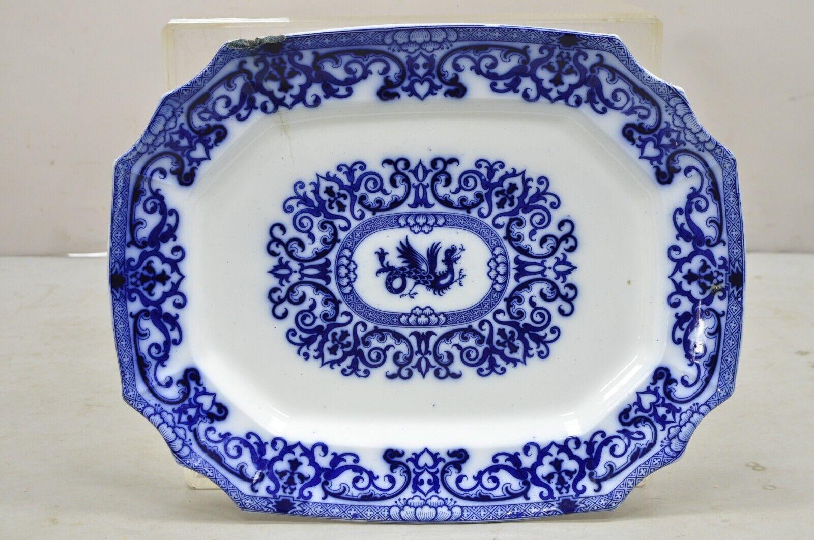 Antique English Flow Blue and White Transferware Ironstone Large Platter Dish with Chinese Dragon. Circa 1800s. Measurements: 2