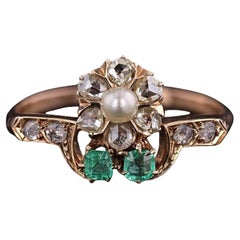 Antique Flower Ring of Pearl, Diamond, and Emerald in 18k Gold