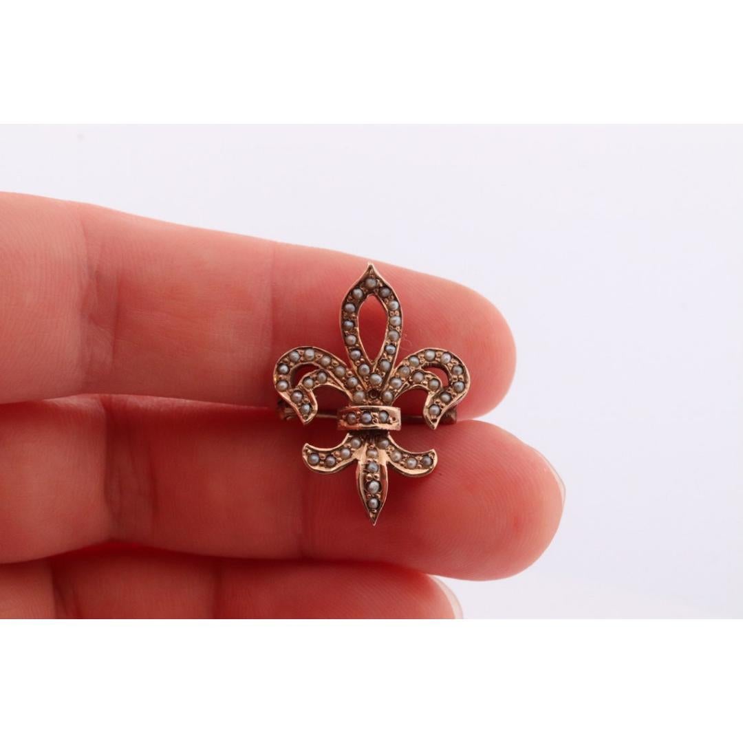 Women's Antique Fluer De Lis Brooch. 10k Pearl Seed encrusted 19th Century French Flower For Sale