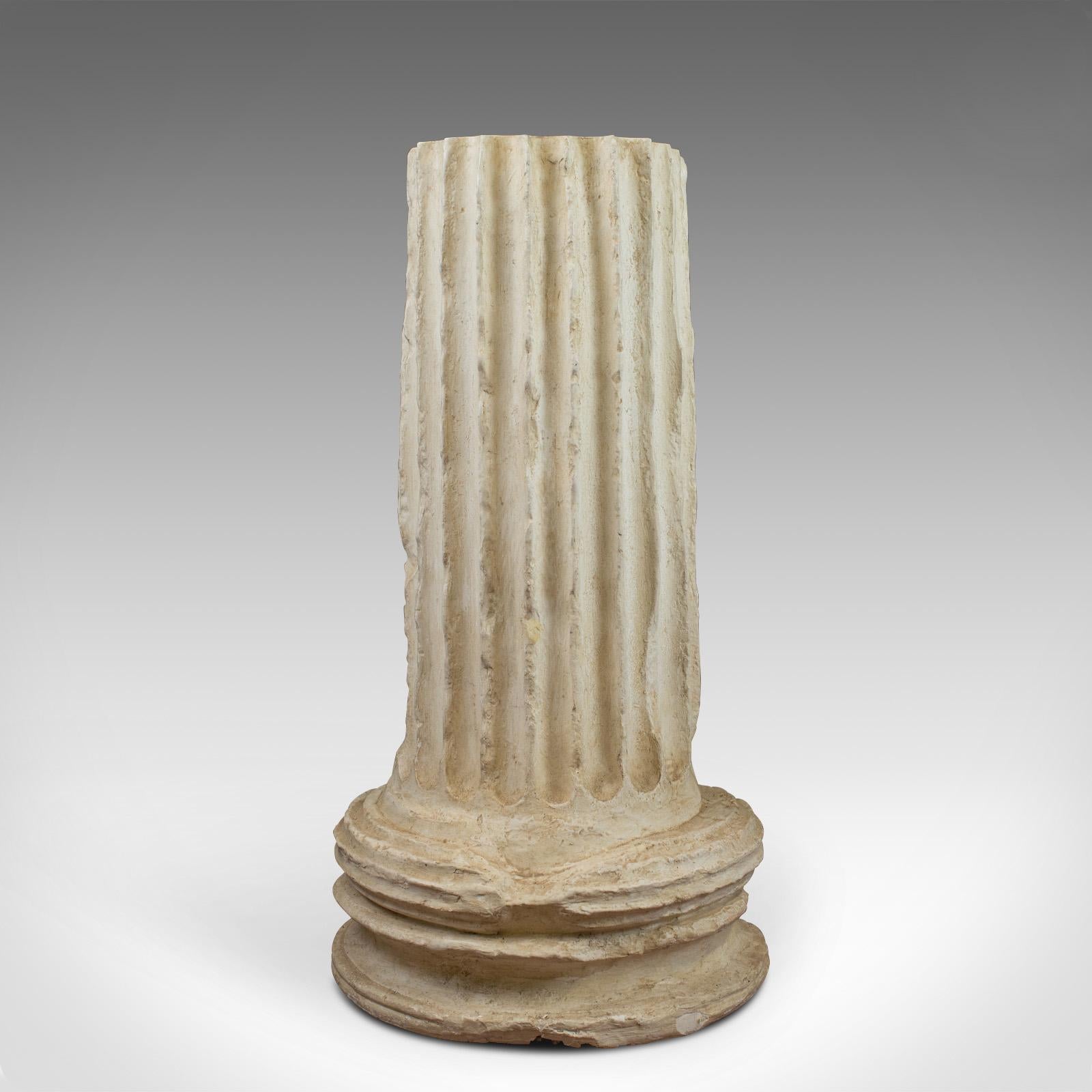 This is an antique fluted column base. A Victorian, architectural plaster pedestal in classical form dating to the turn of the 20th century, circa 1900.

Presented in original condition, pleasingly distressed
Attractive Victorian, classical