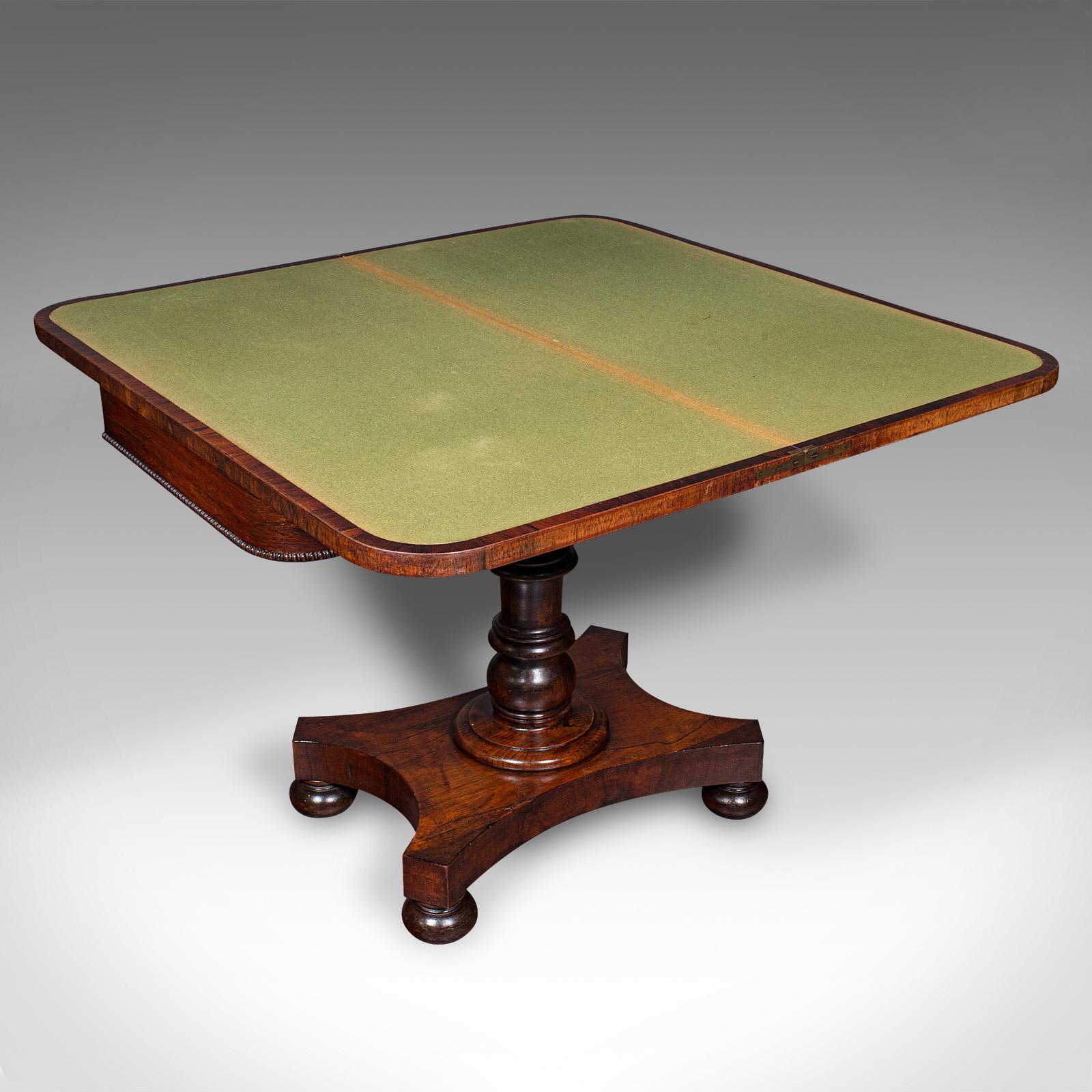 This is an antique fold-over card table. An English, rosewood games or console table, dating to the Regency period, circa 1820.

Superb craftsmanship distinguishes this fine gentleman's card table
Displays a desirable aged patina and in good