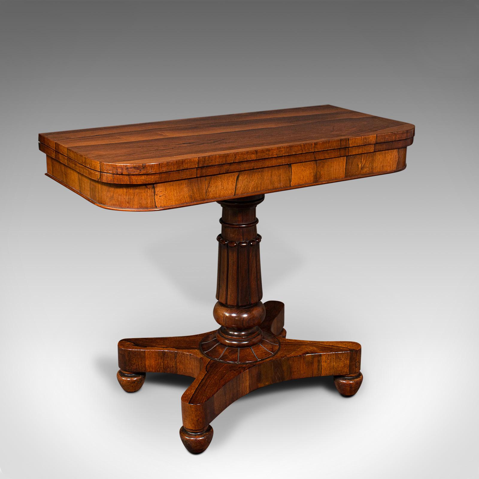 This is an exceptional antique fold-over card table. An English, rosewood games or console table, dating to the William IV period, circa 1835.

Magnificent craftsmanship distinguishes this fine gentleman's card table
Displays a desirable aged patina