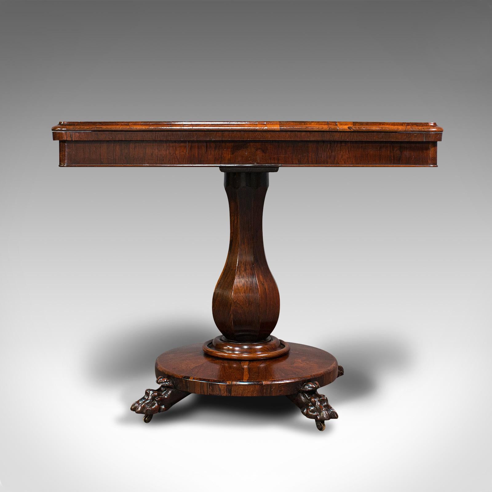 Our Stock # 18.7192

This is a striking antique folding card table. An English, rosewood gaming or bridge table benefiting from a recent professional restoration, dating to the early Victorian period, circa 1850.

Graced with fascinating and