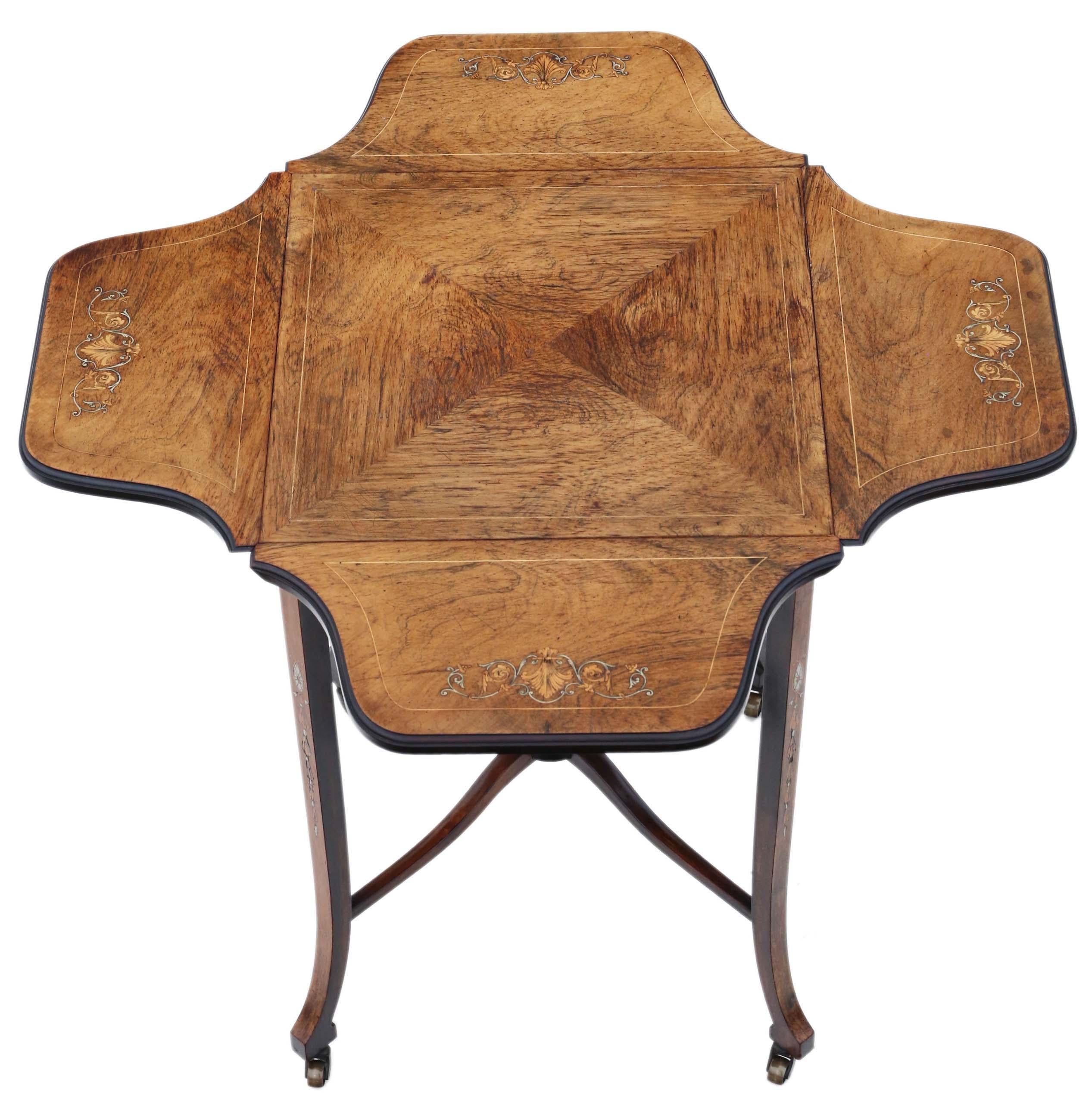Antike feine Qualität C1900 Faltung Intarsien Mitte Seite Beistelltisch geformt.

Dies ist ein wunderschöner Tisch von höchster Qualität, der voller Alter, Charme und Charakter ist.

Seltener und attraktiver antiker Qualitätsfund.

Der Tisch